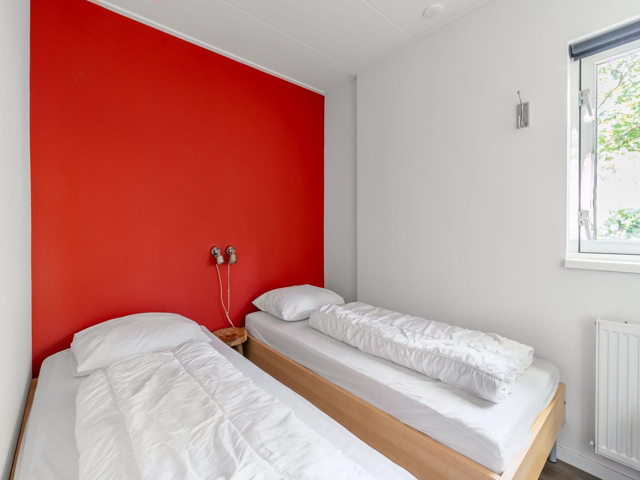 Een slaapkamer van Pelikaanweg 21 in De Koog