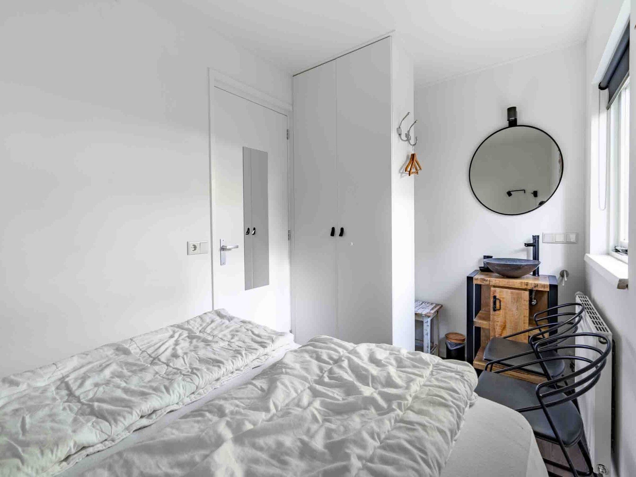 Een slaapkamer van Pelikaanweg 21 in De Koog