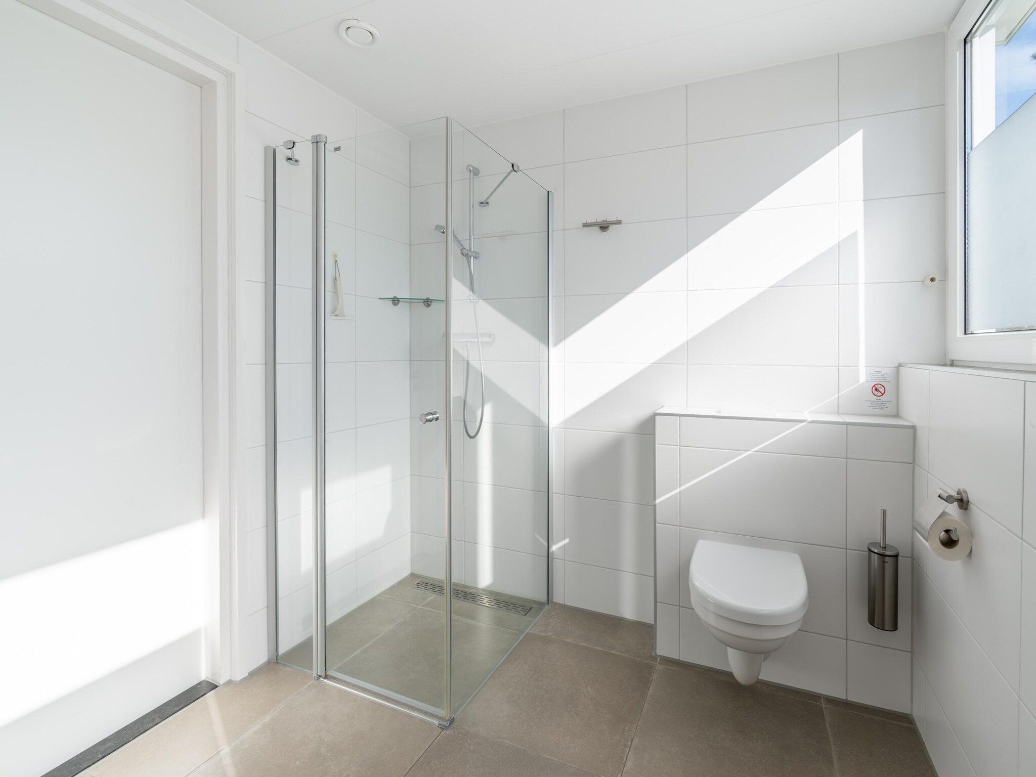 De badkamer van Tempelierweg 23 in Den Burg