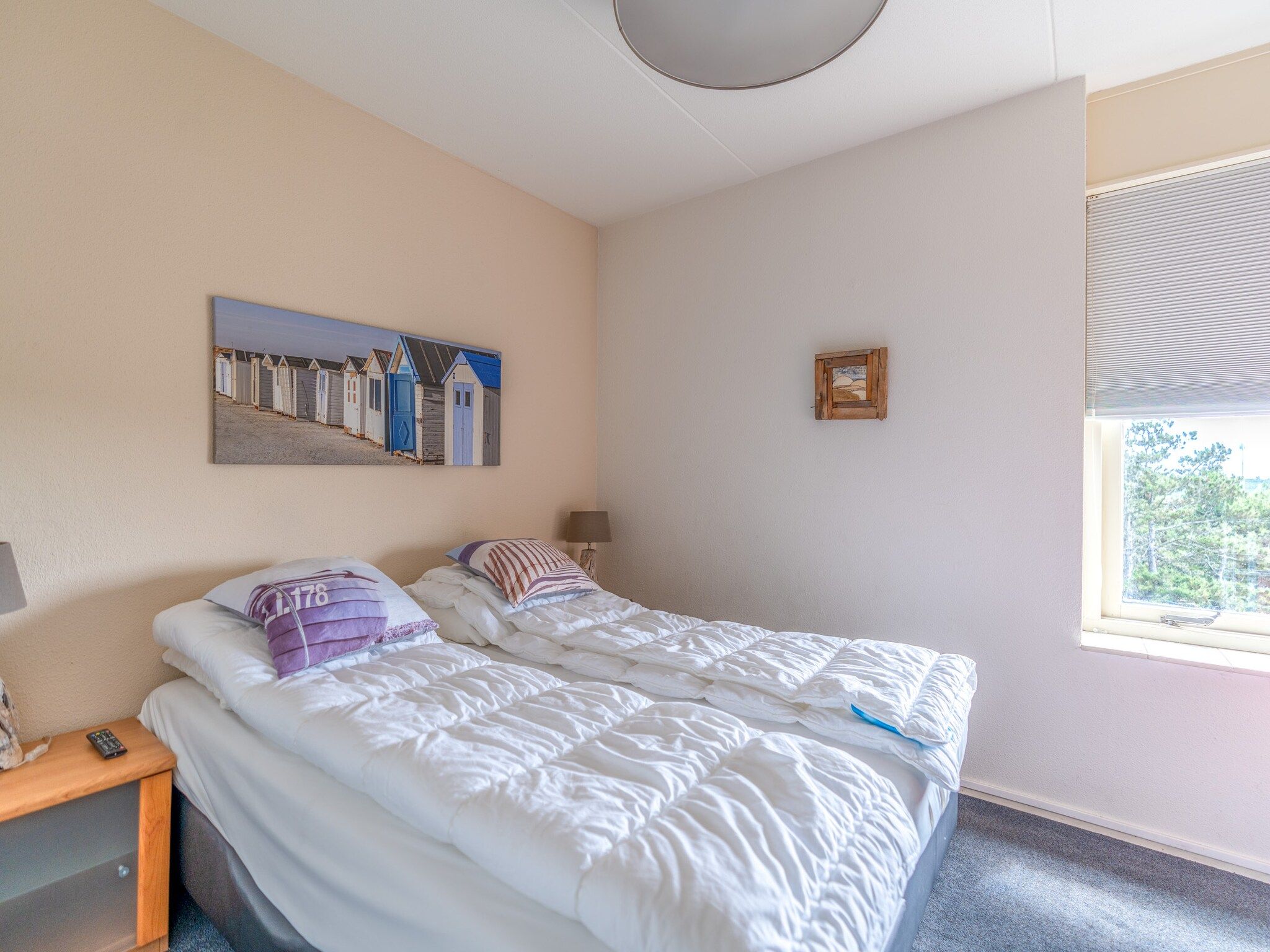 Een slaapkamer van Juliana 038 in De Koog