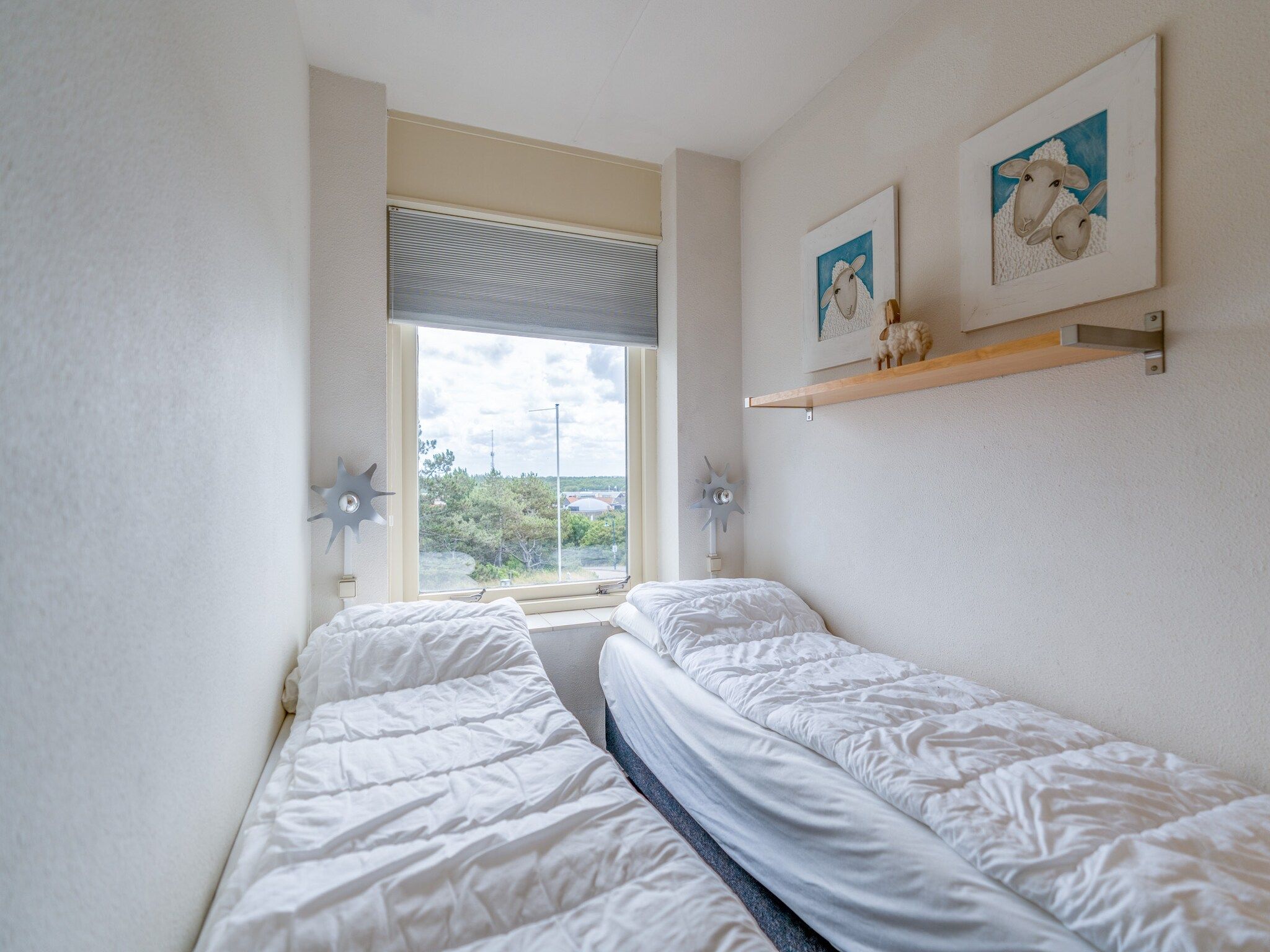 Een slaapkamer van Juliana 038 in De Koog