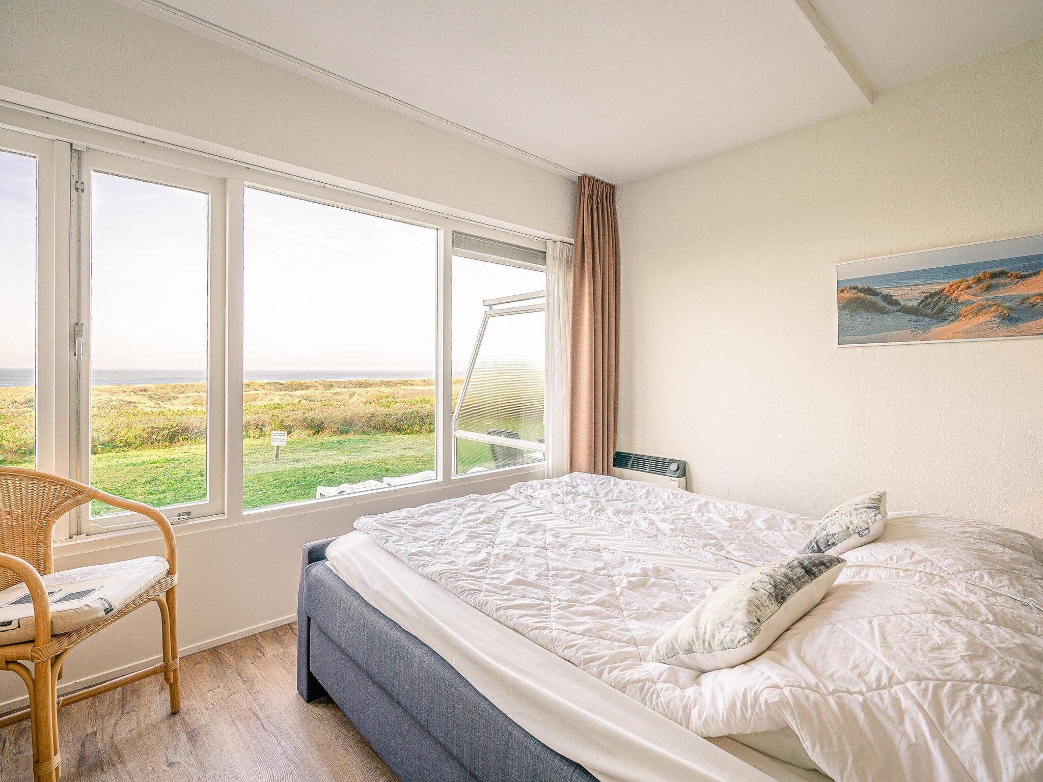 Een slaapkamer van Juliana 056 in De Koog