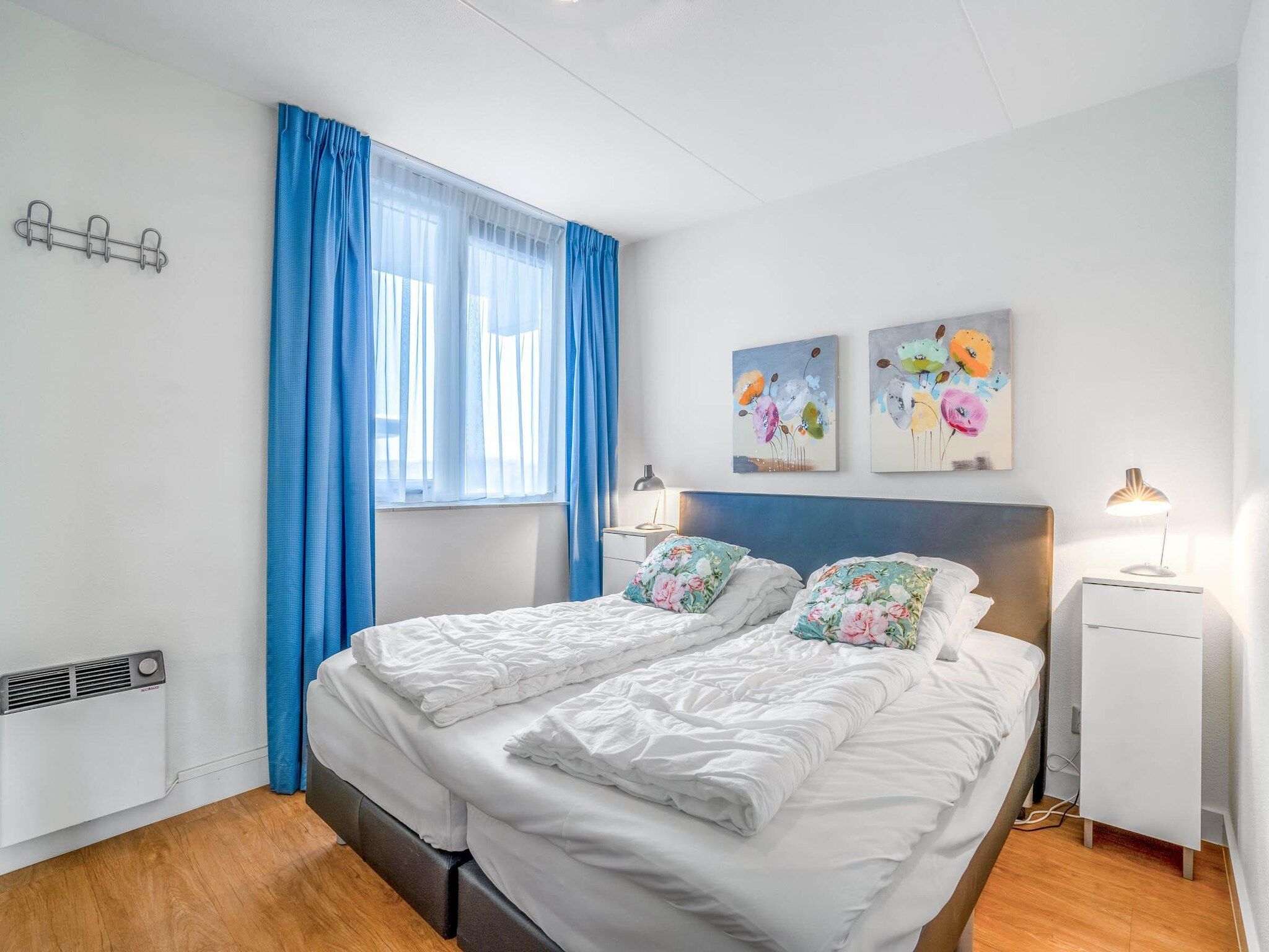 Een slaapkamer van Juliana 052 in De Koog