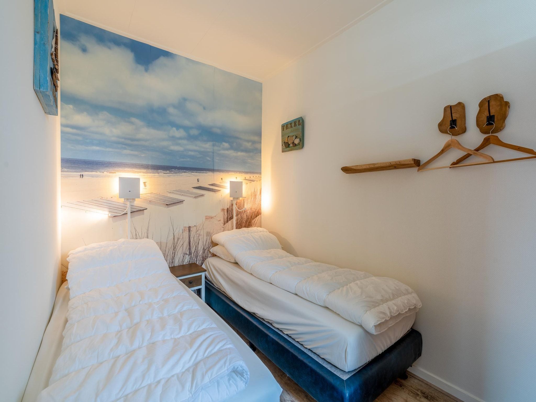 Een slaapkamer van De Anna 222 - Strand in De Koog