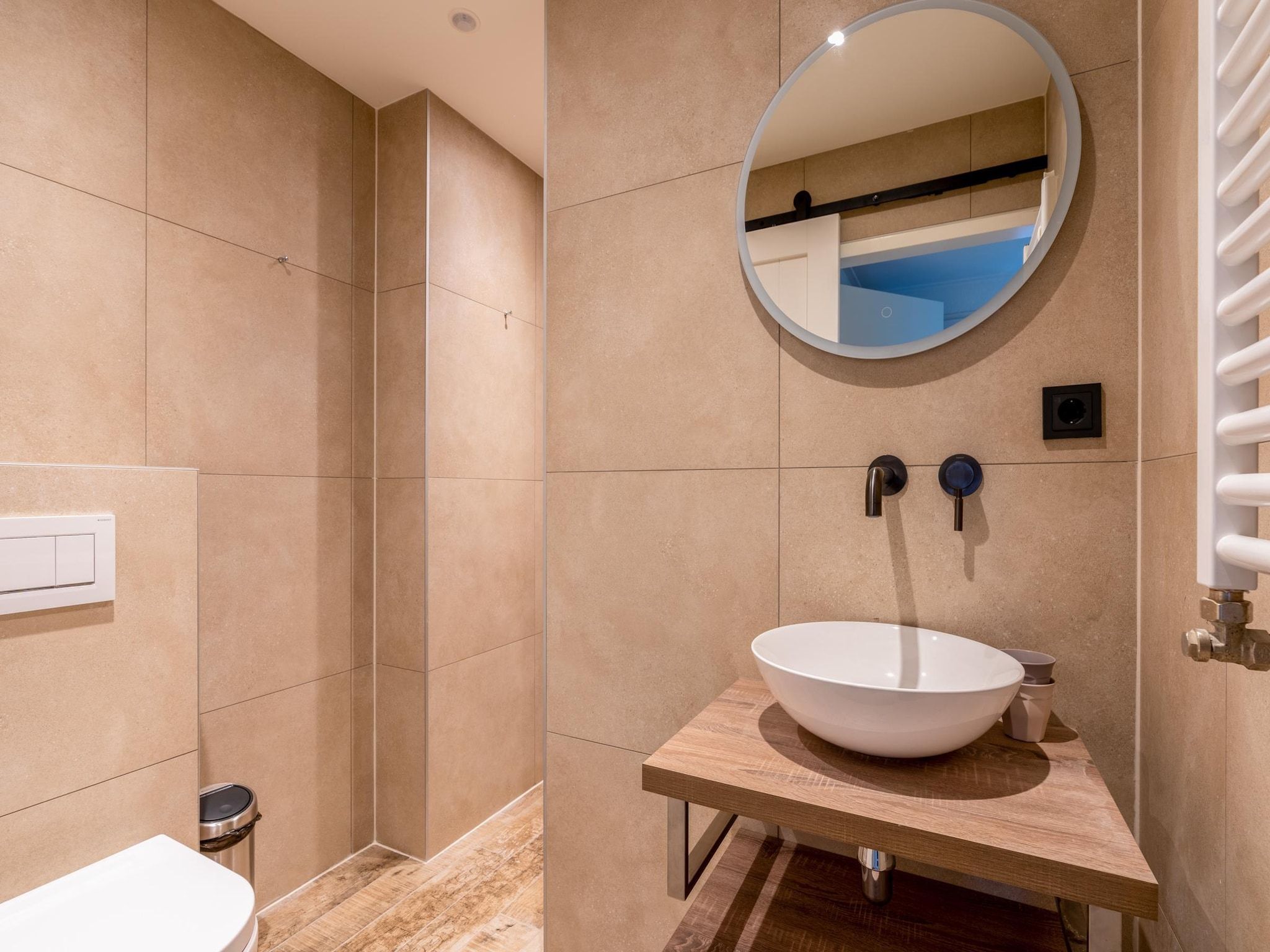 De badkamer van De Anna 222 - Strand in De Koog