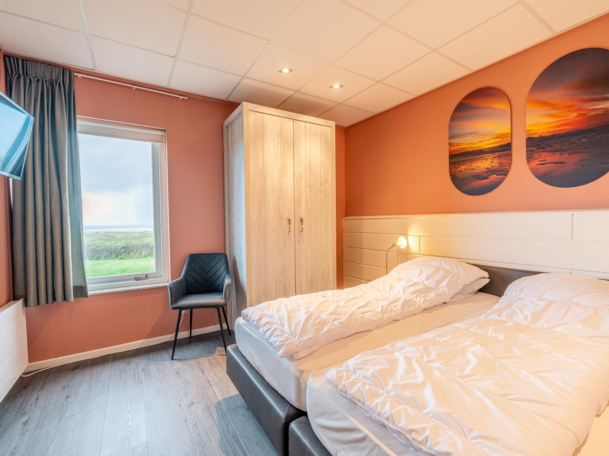 Een slaapkamer van Juliana 028 in De Koog