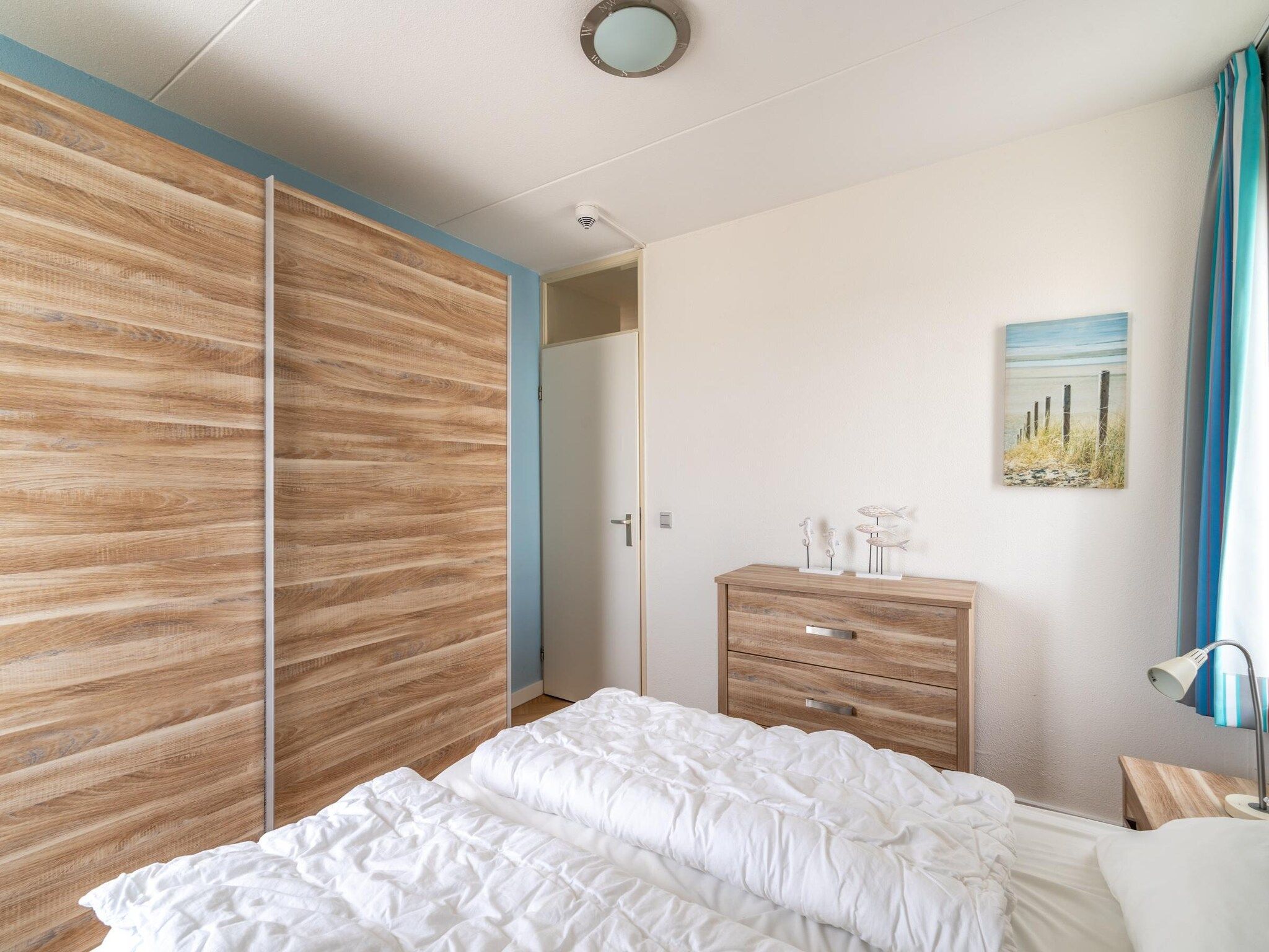 Een slaapkamer van Juliana 036 in De Koog