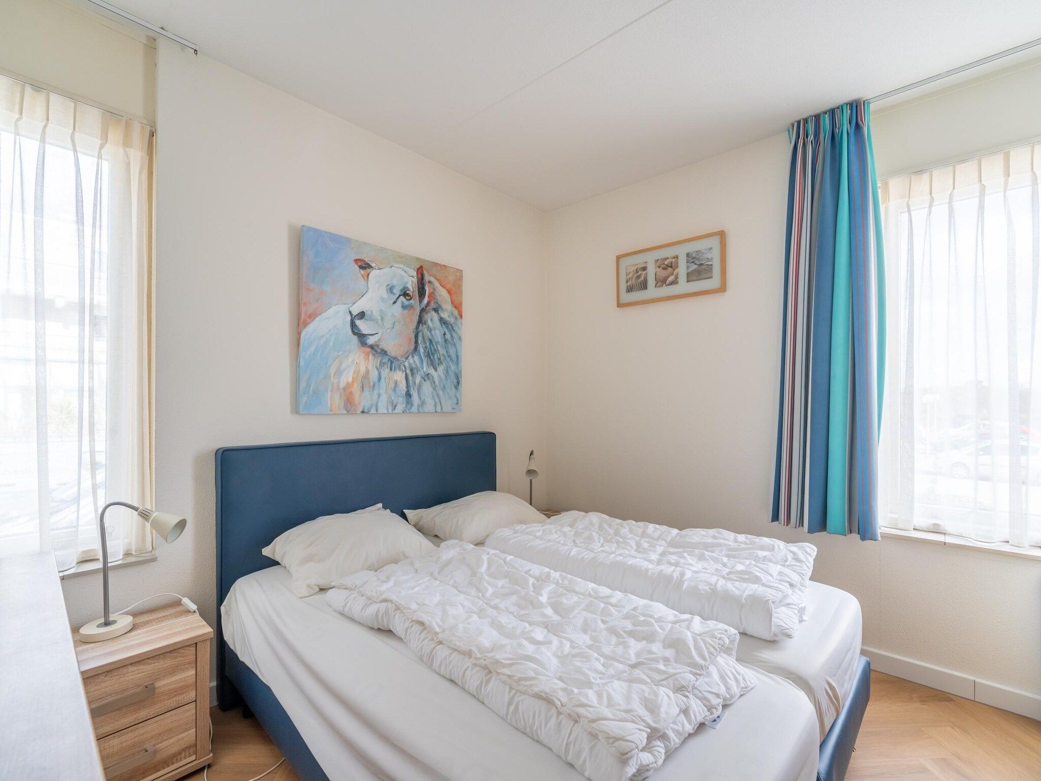 Een slaapkamer van Juliana 036 in De Koog