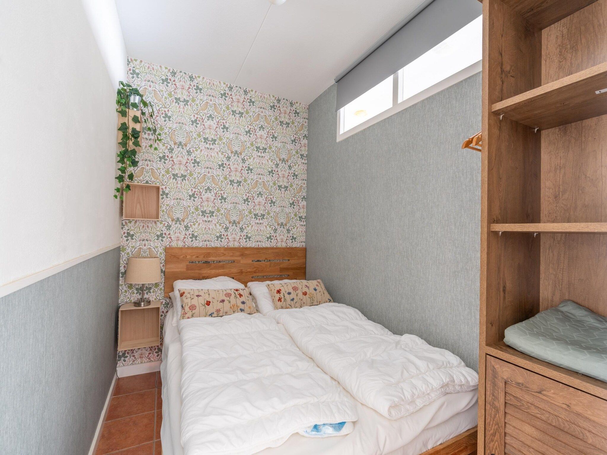 Een slaapkamer van Juliana 142 in De Koog