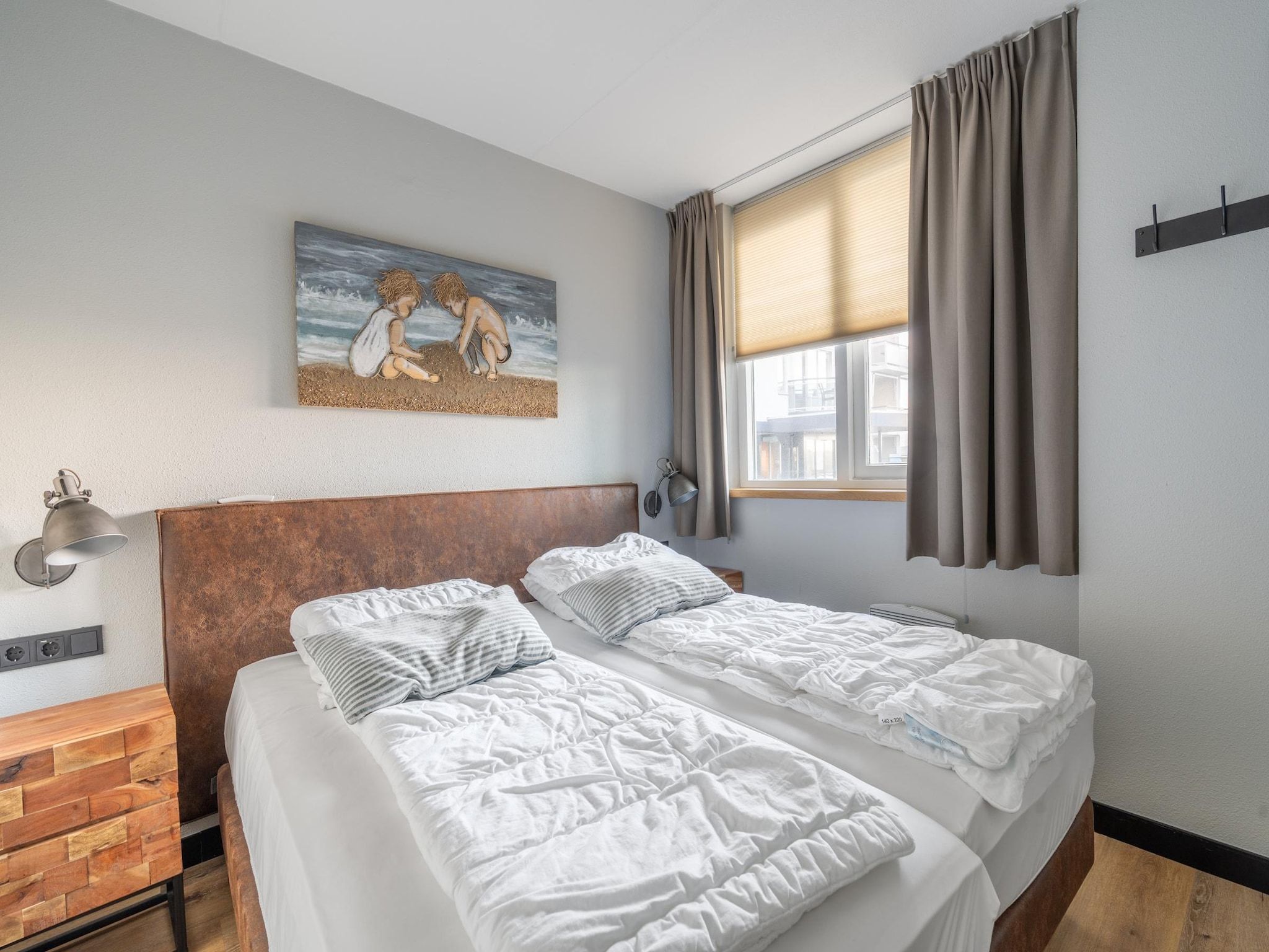 Een slaapkamer van Juliana 044 in De Koog