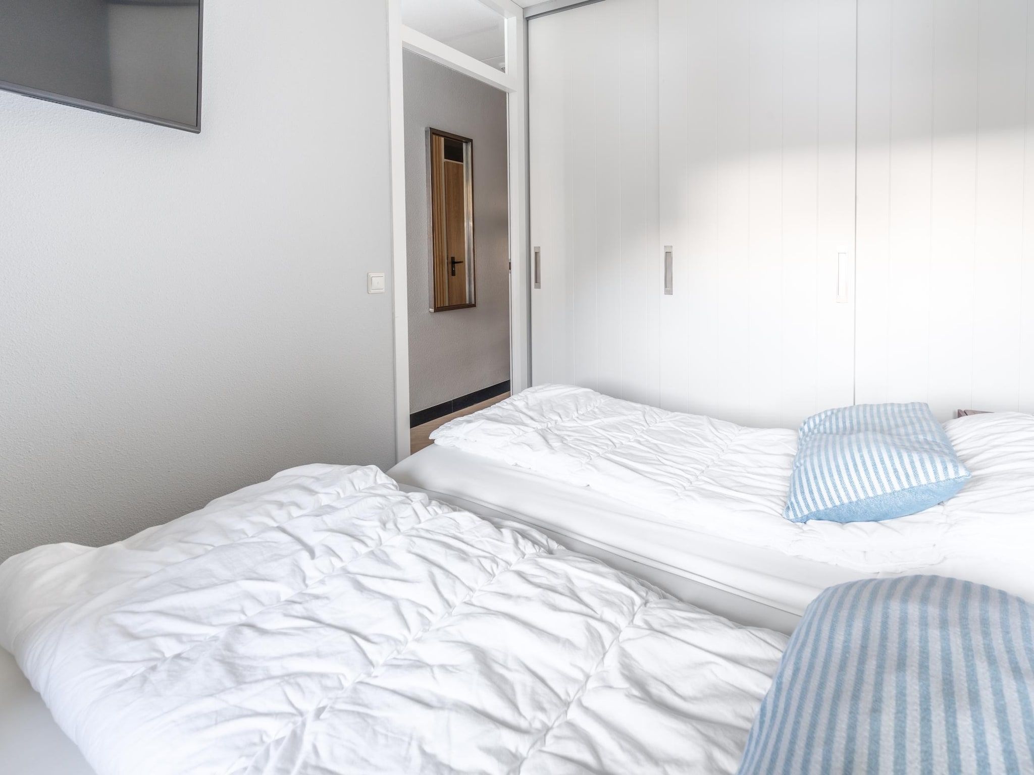 Een slaapkamer van Juliana 044 in De Koog