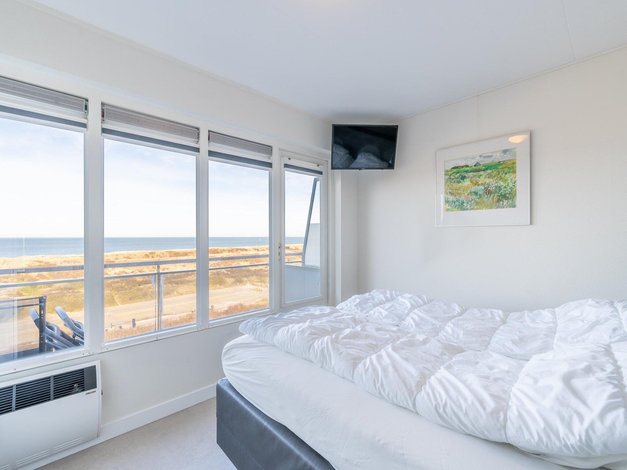 Een slaapkamer van Juliana 152 in De Koog