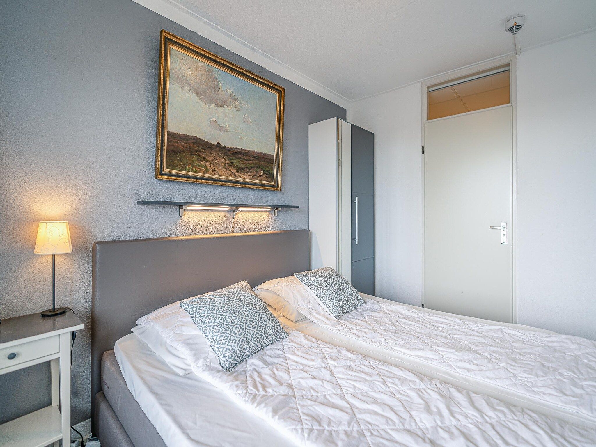 Een slaapkamer van Juliana 078 in De Koog