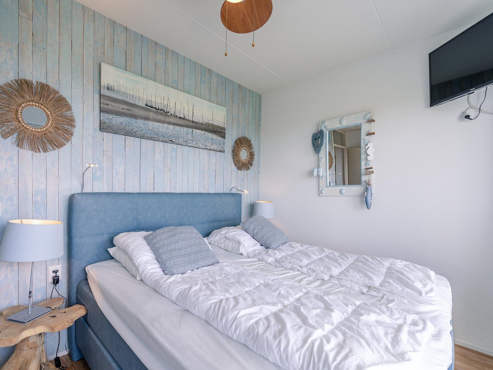 Een slaapkamer van Juliana 106 in De Koog