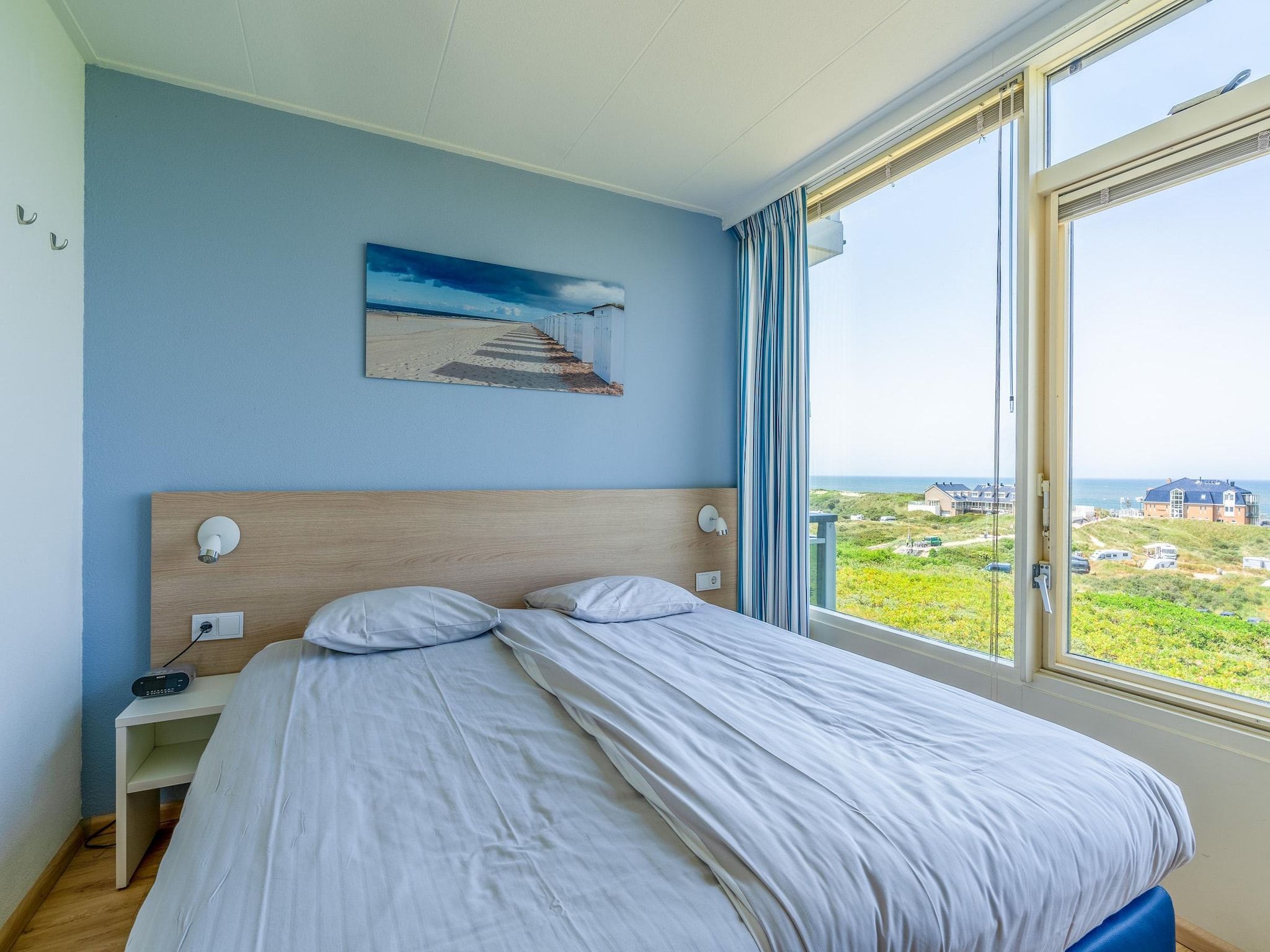 Een slaapkamer van Juliana 110 in De Koog