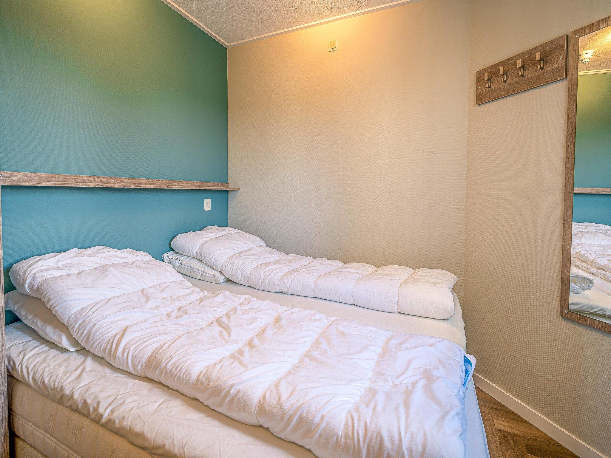 Een slaapkamer van Zeedistel 22 in De Koog