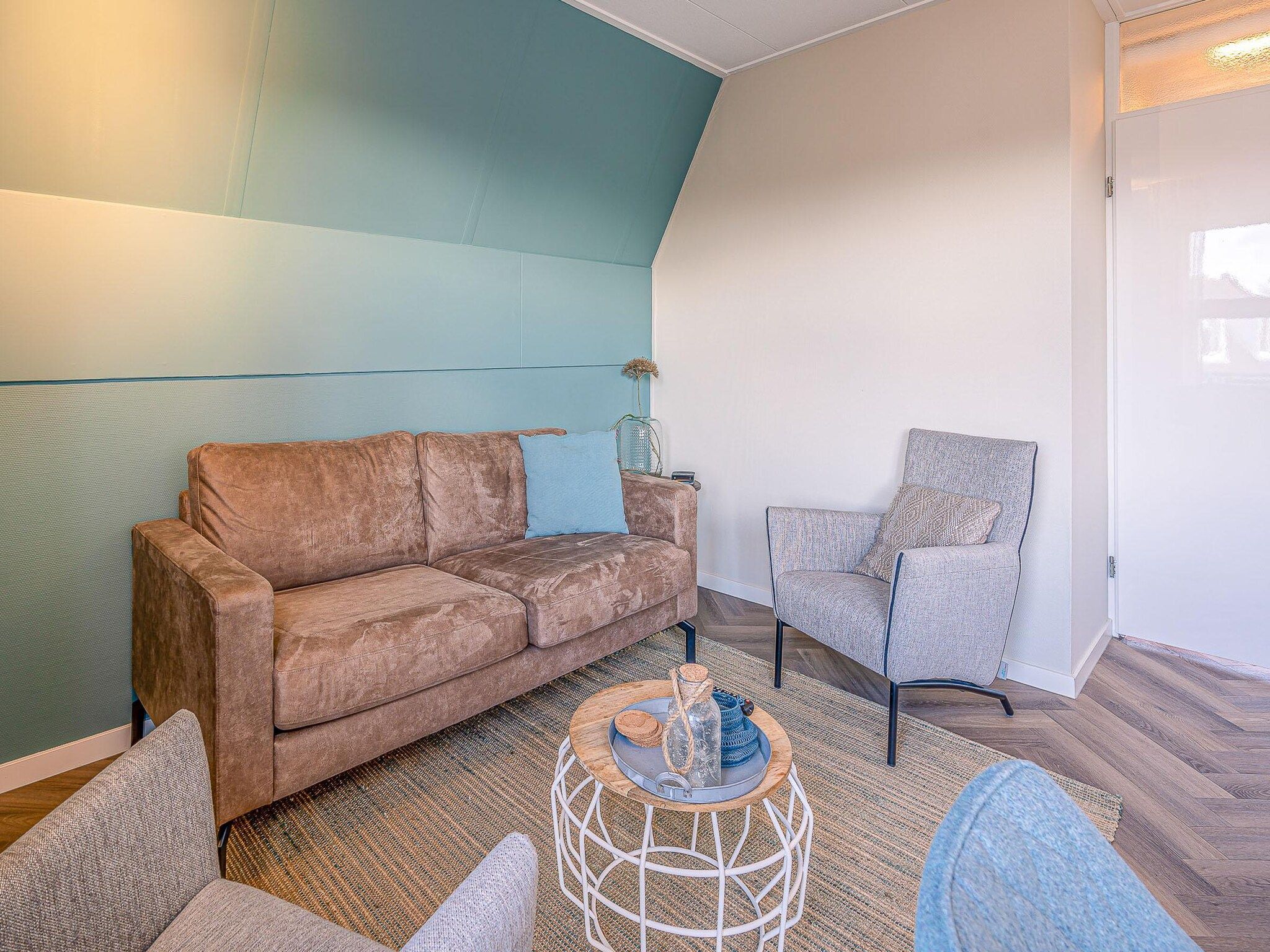 De woonkamer van Zeedistel 22 in De Koog