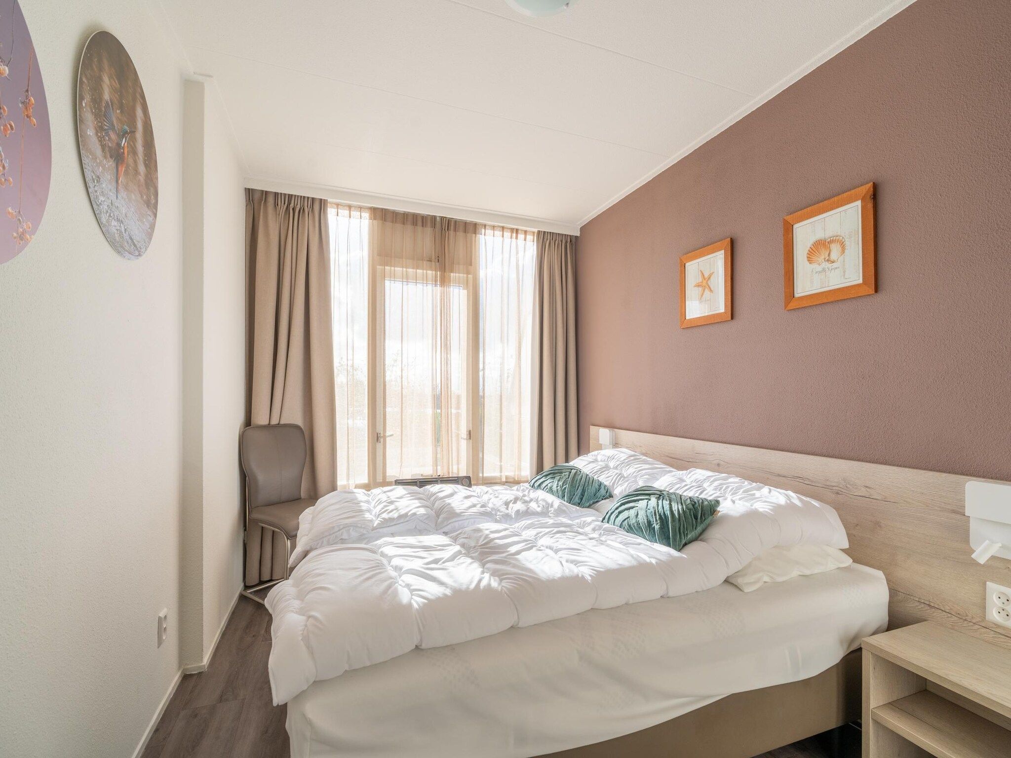 Een slaapkamer van Juliana 074 in De Koog