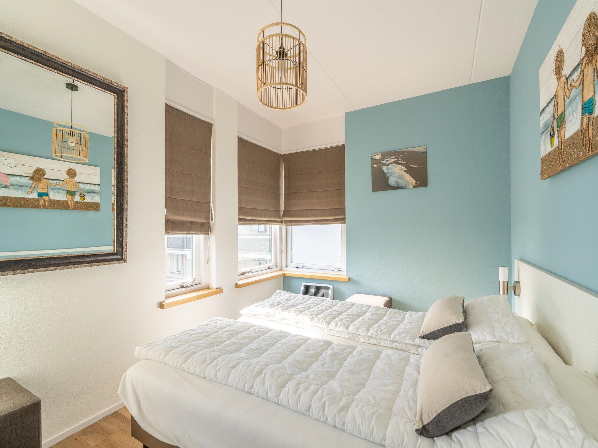 Een slaapkamer van Juliana 080 in De Koog