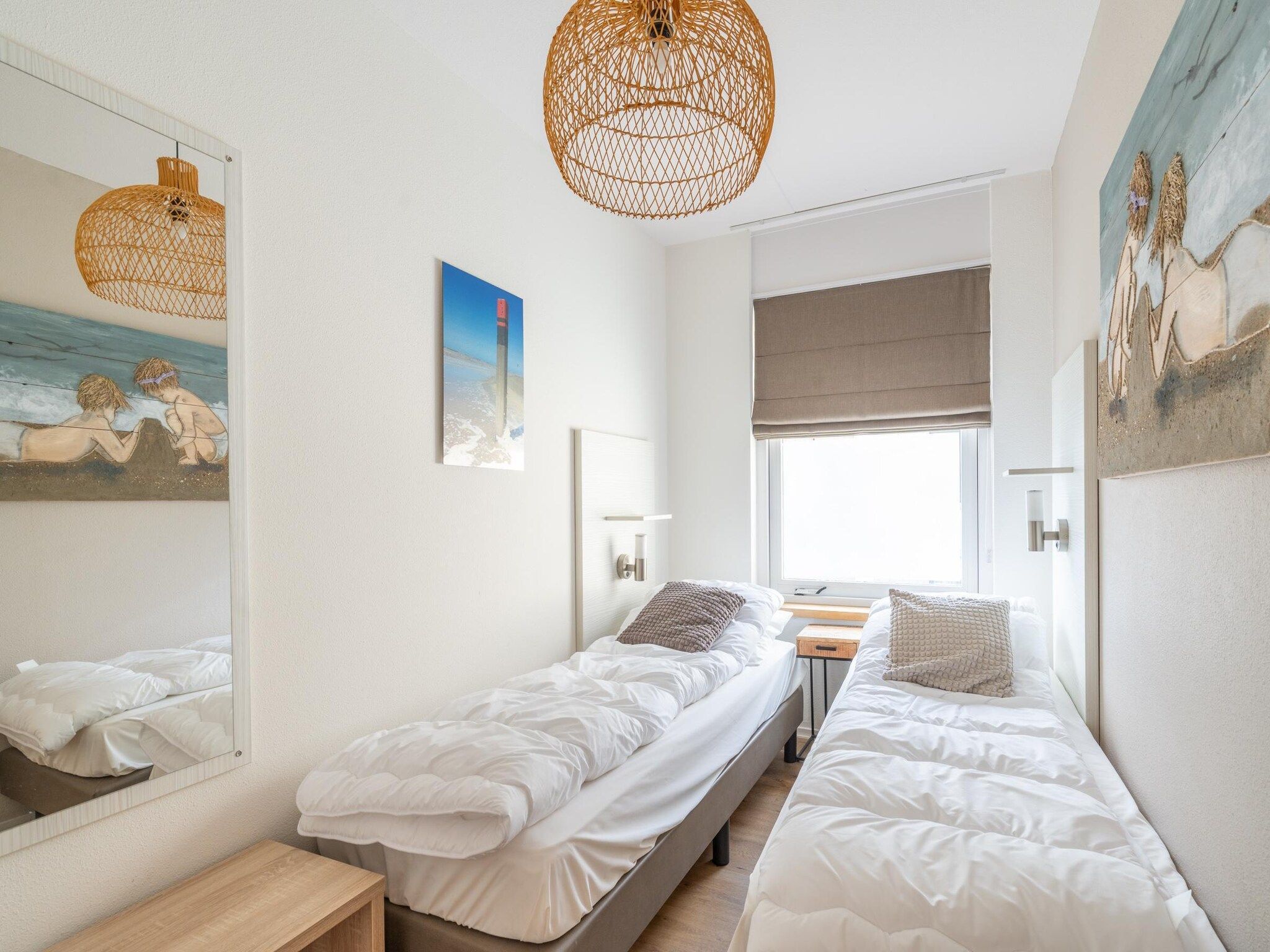 Een slaapkamer van Juliana 080 in De Koog