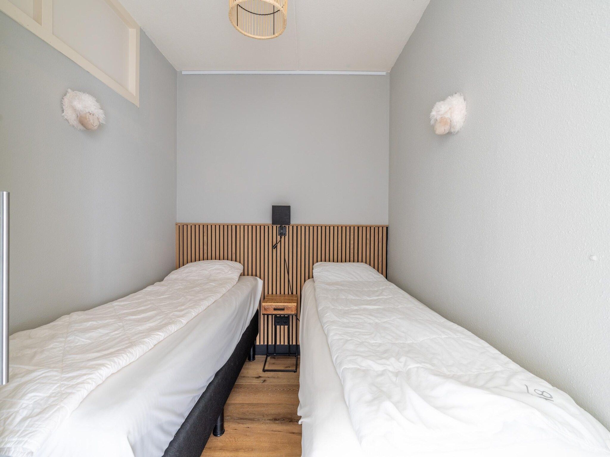 Een slaapkamer van Juliana 086 in De Koog