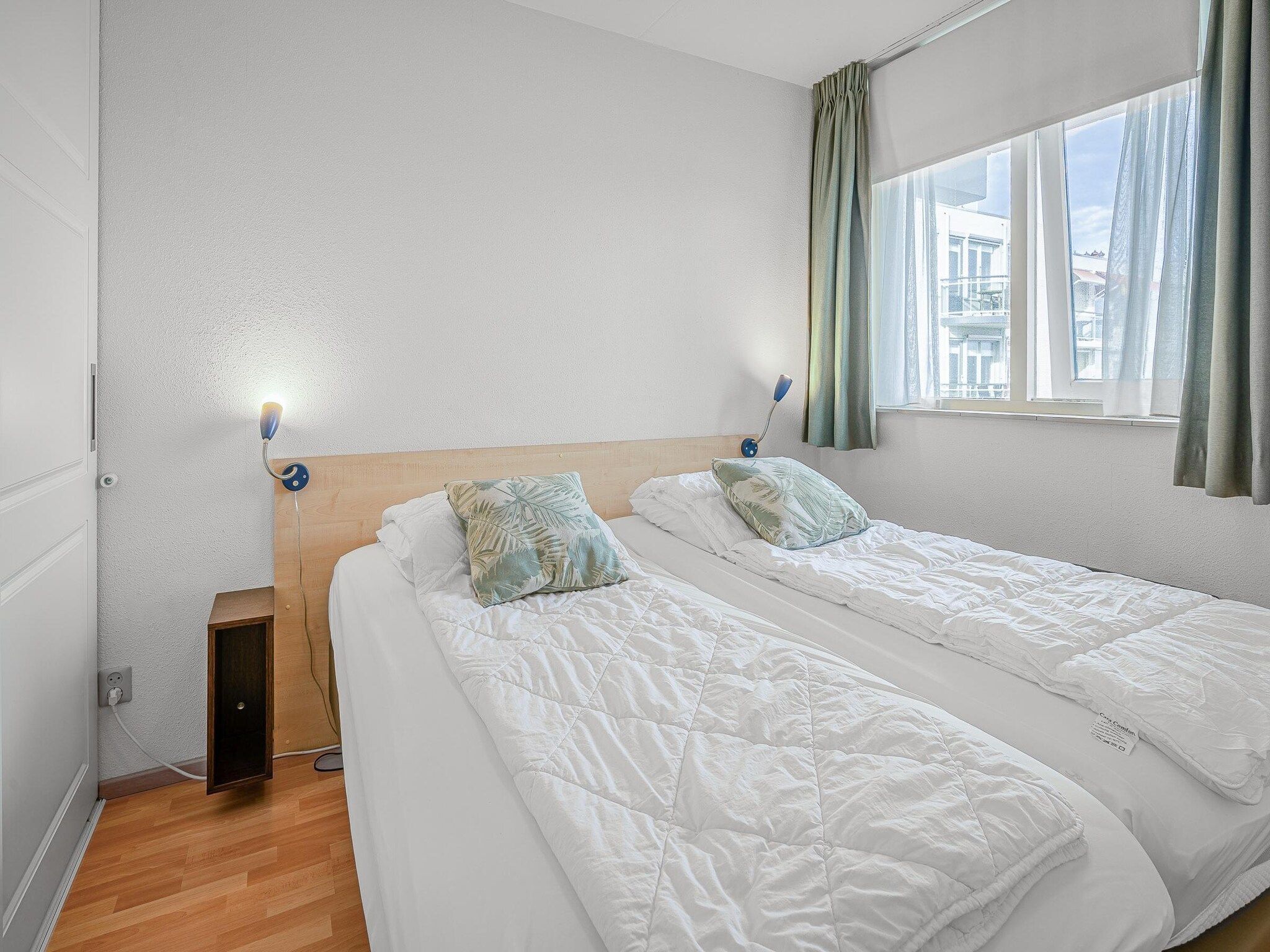 Een slaapkamer van Juliana 090 in De Koog