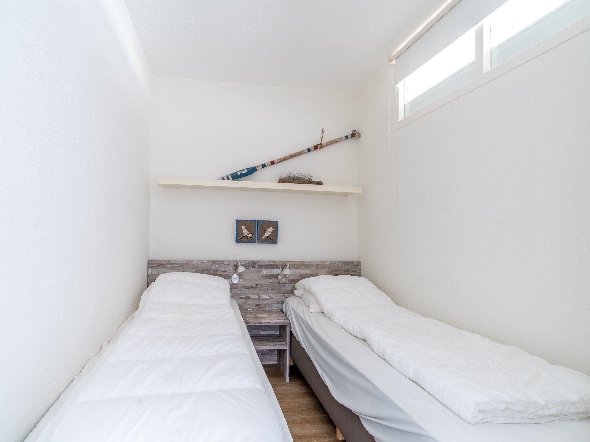 Een slaapkamer van Juliana 092 in De Koog