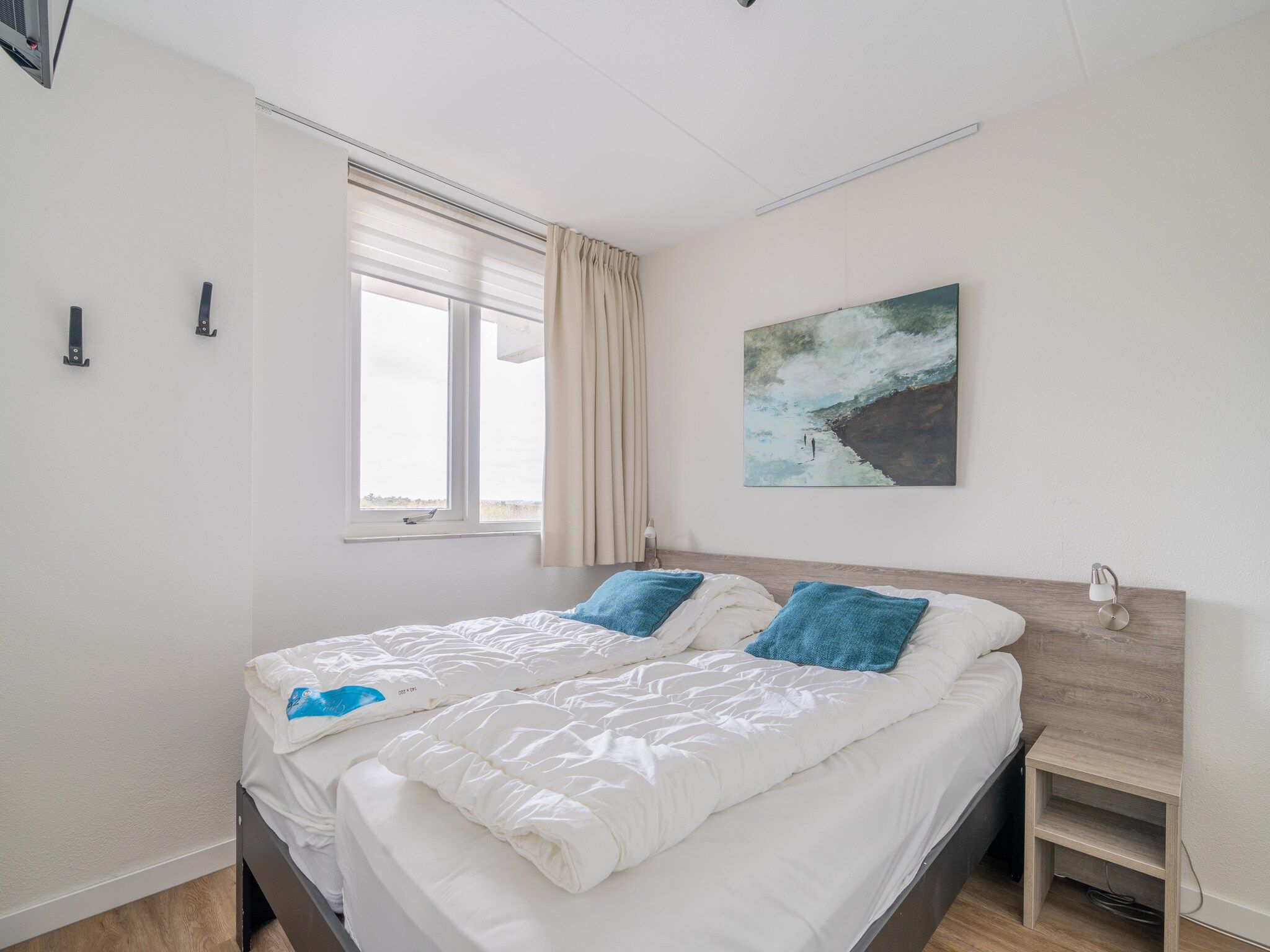 Een slaapkamer van Juliana 092 in De Koog