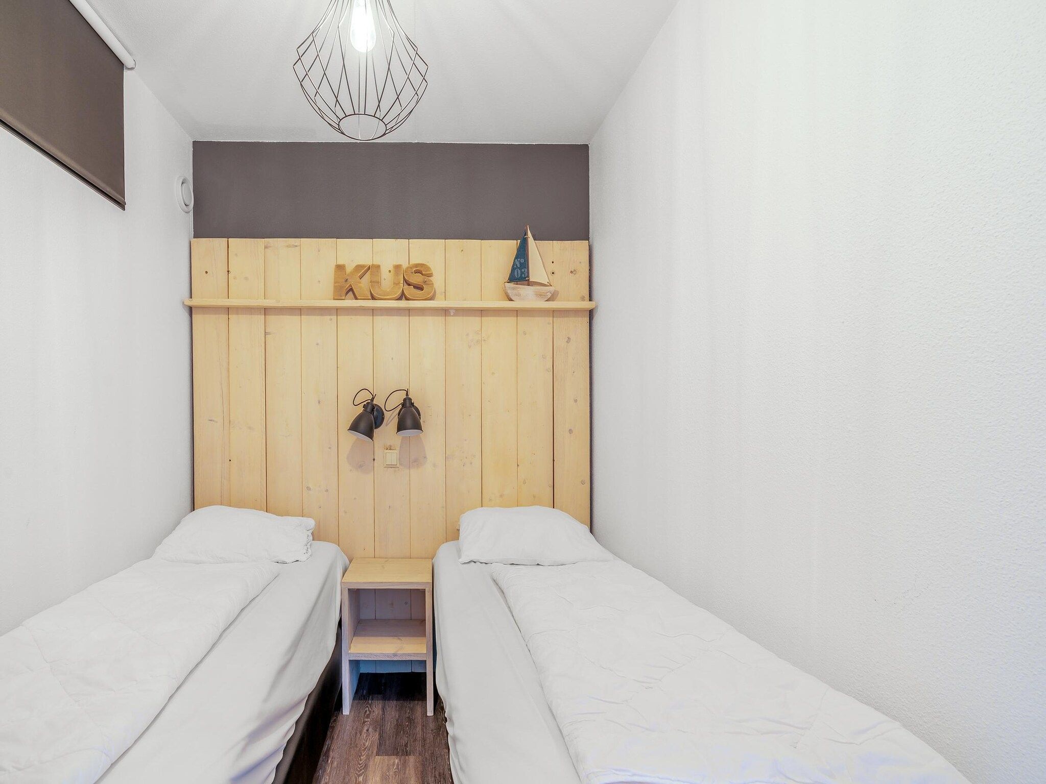 Een slaapkamer van Juliana 094 in De Koog