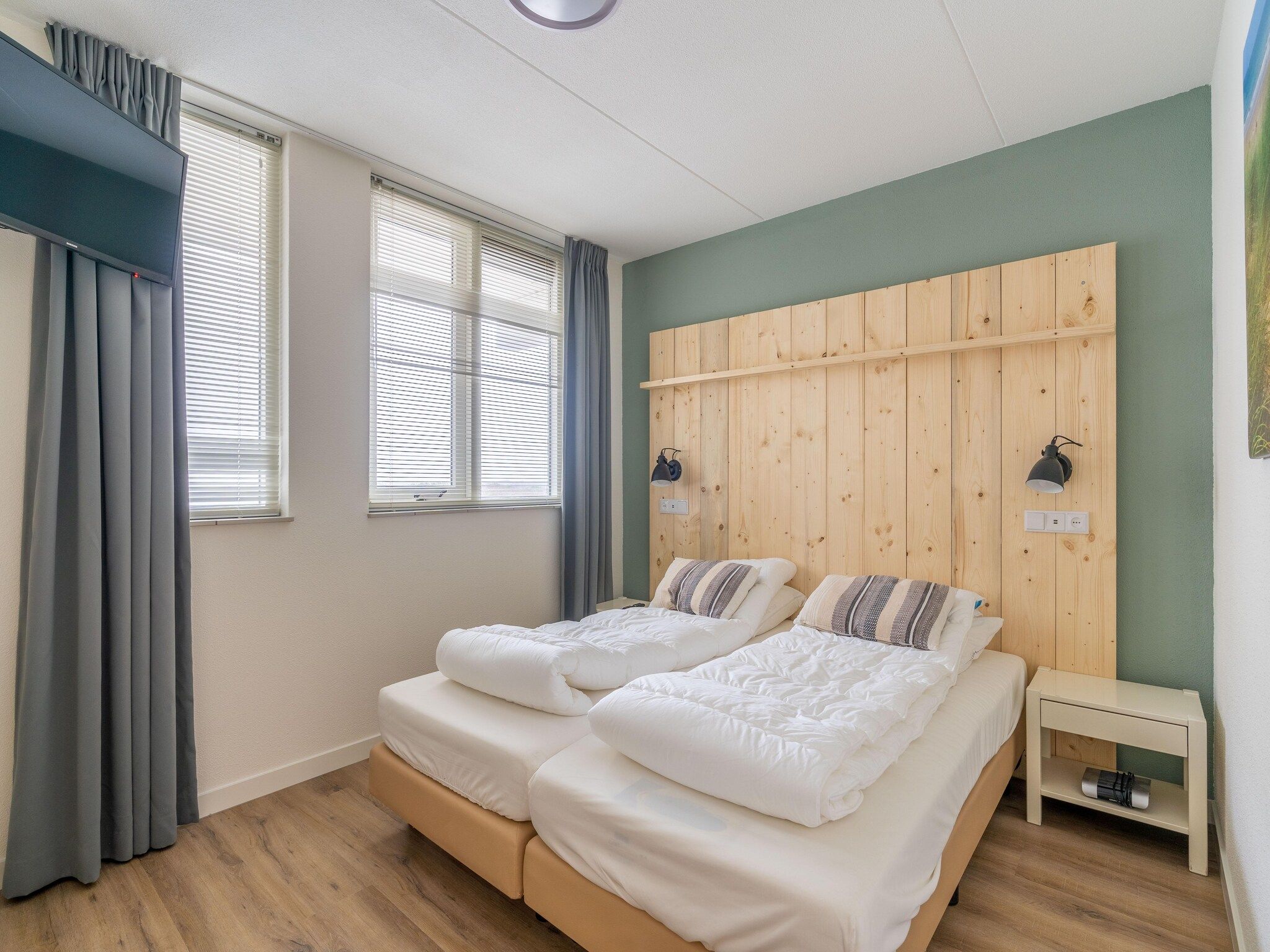 Een slaapkamer van Juliana 098 in De Koog