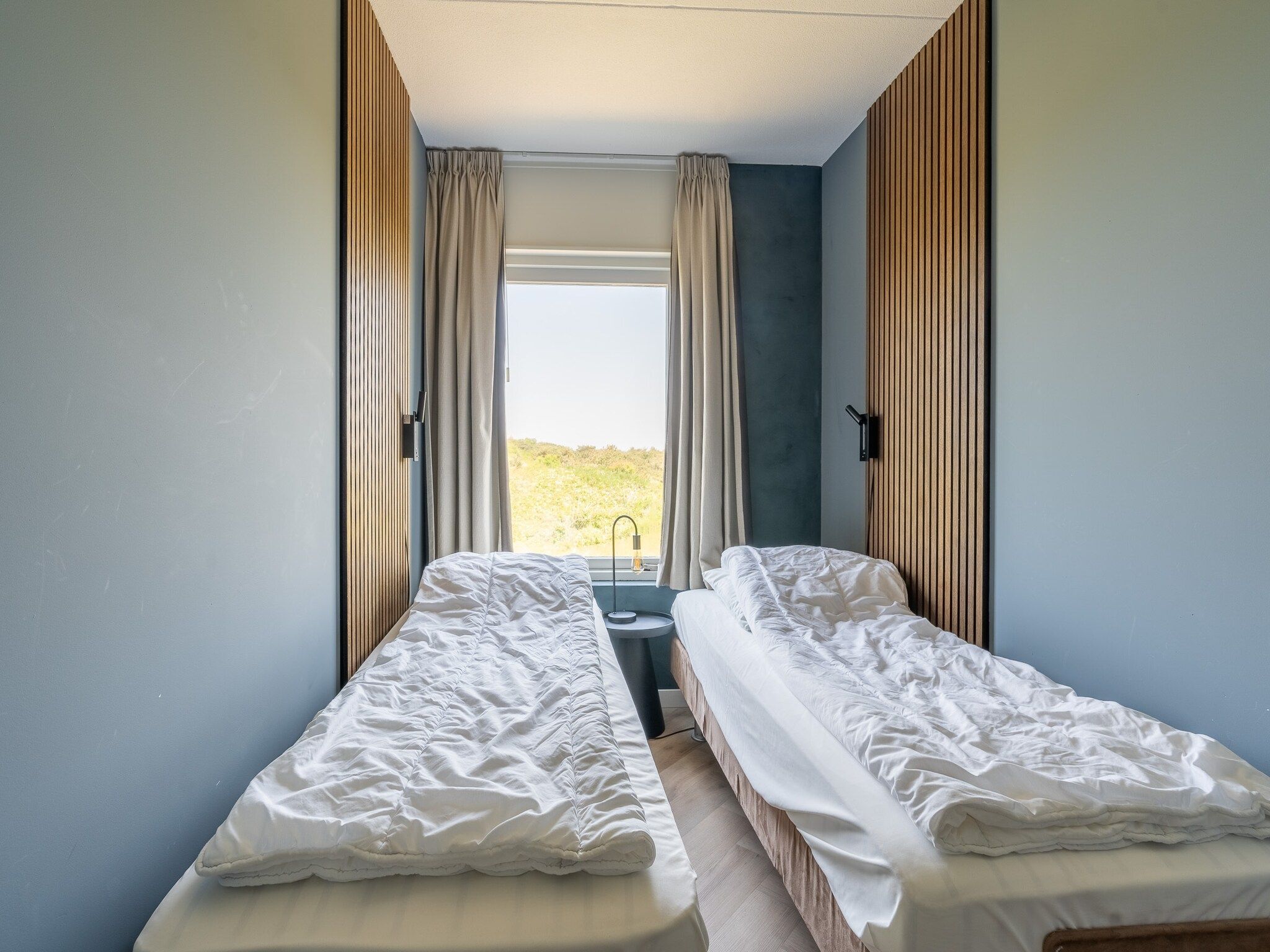 Een slaapkamer van Juliana 120 in De Koog