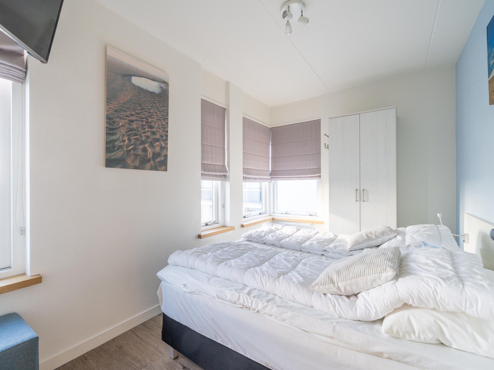 Een slaapkamer van Juliana 130 in De Koog