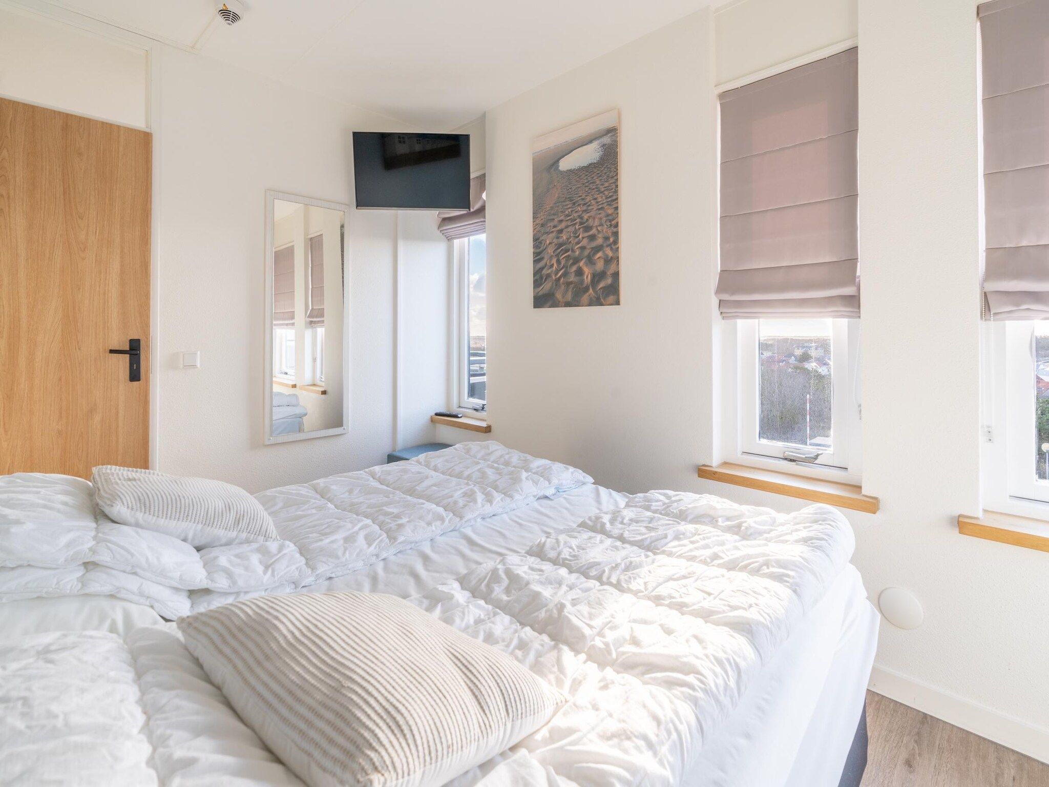 Een slaapkamer van Juliana 130 in De Koog