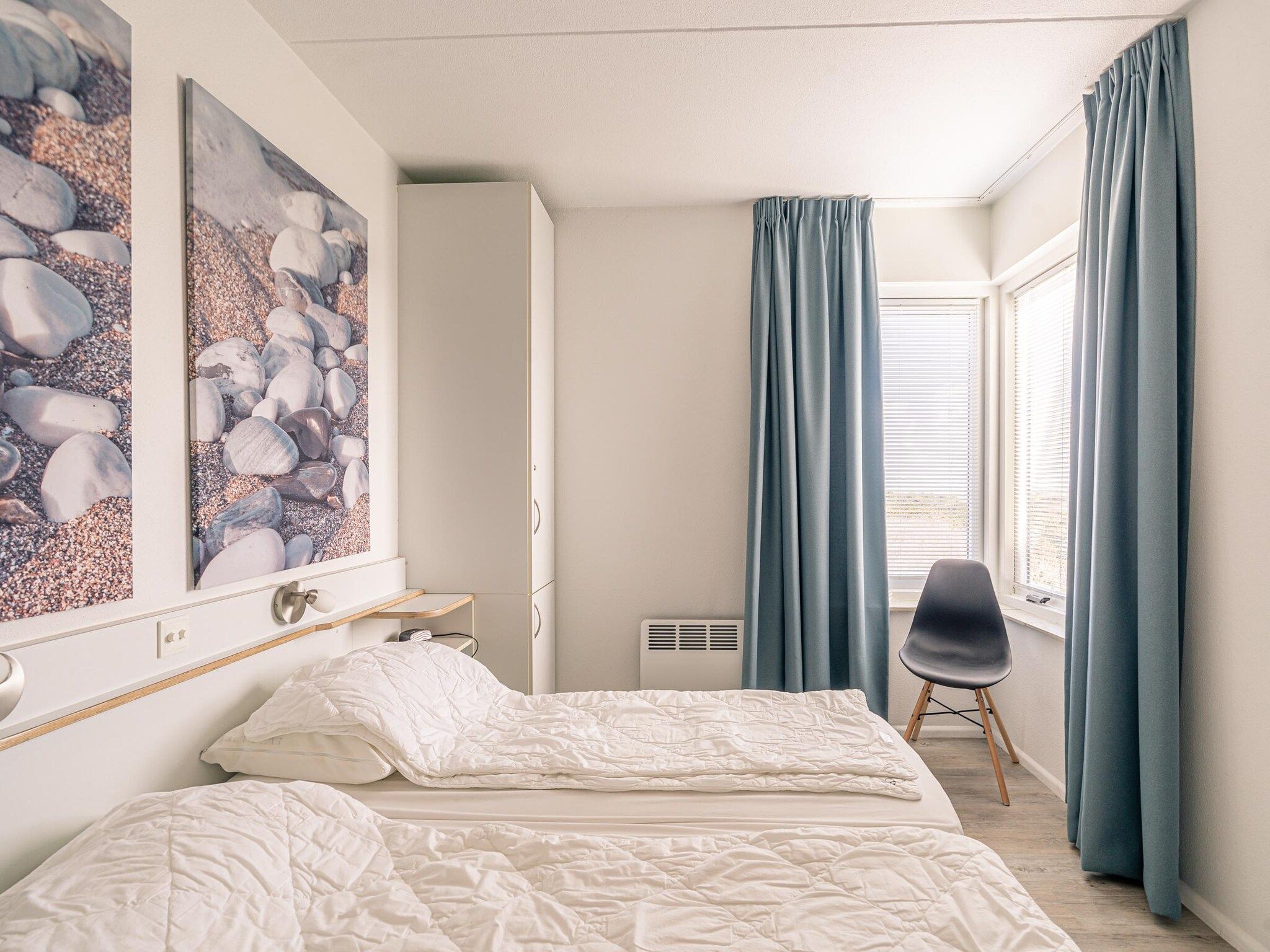 Een slaapkamer van Juliana 132 in De Koog