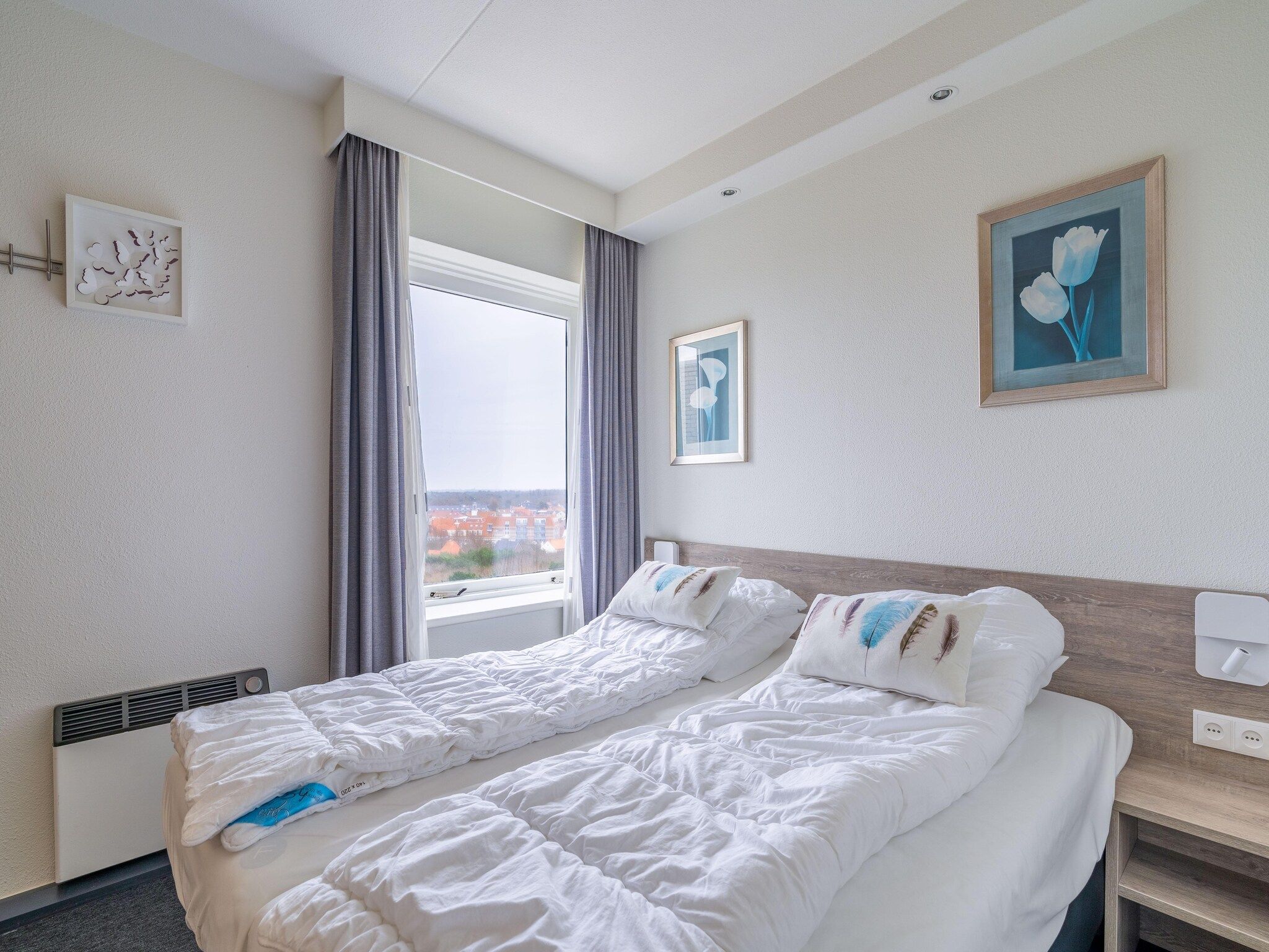 Een slaapkamer van Juliana 134 in De Koog