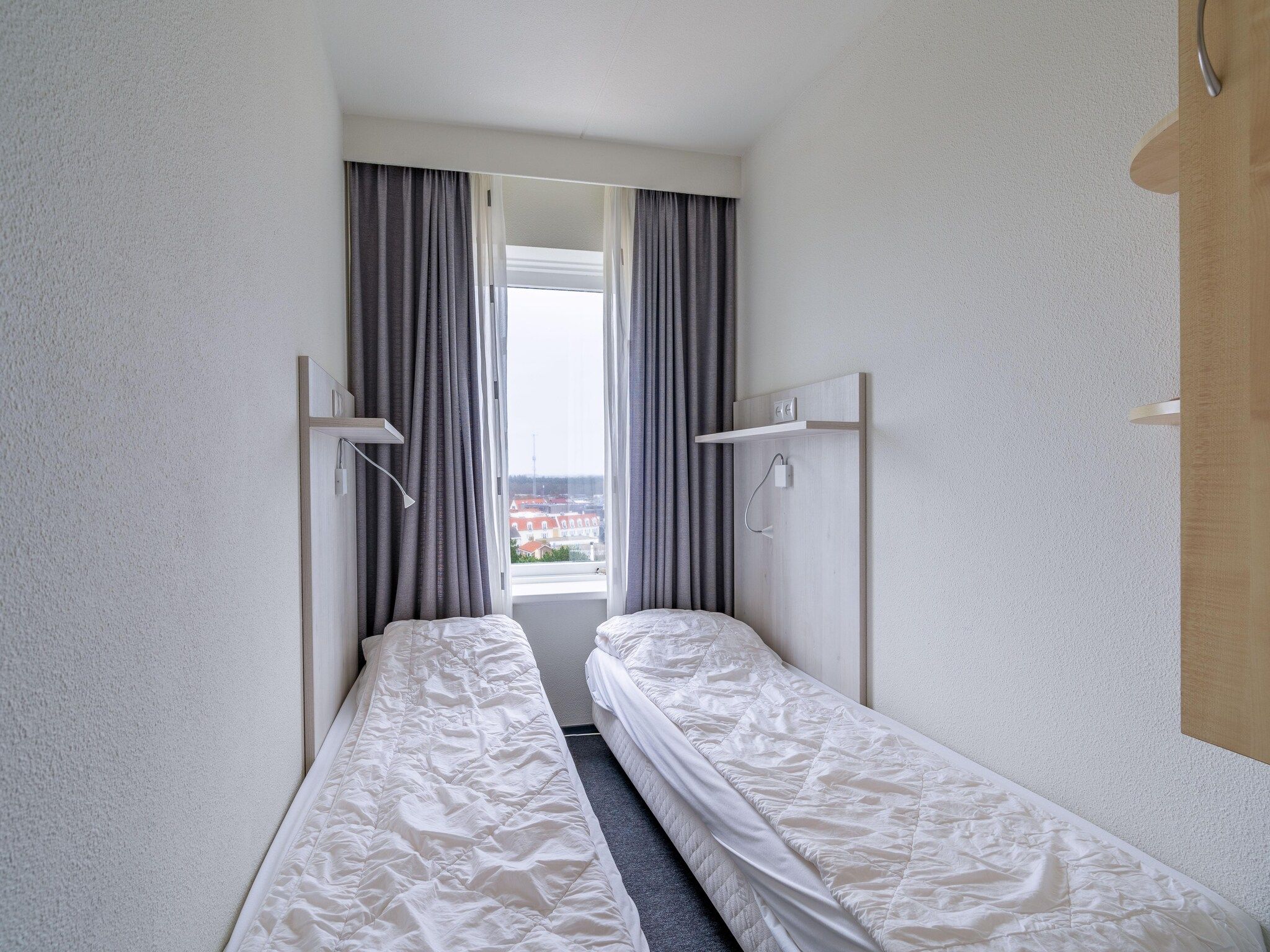 Een slaapkamer van Juliana 134 in De Koog