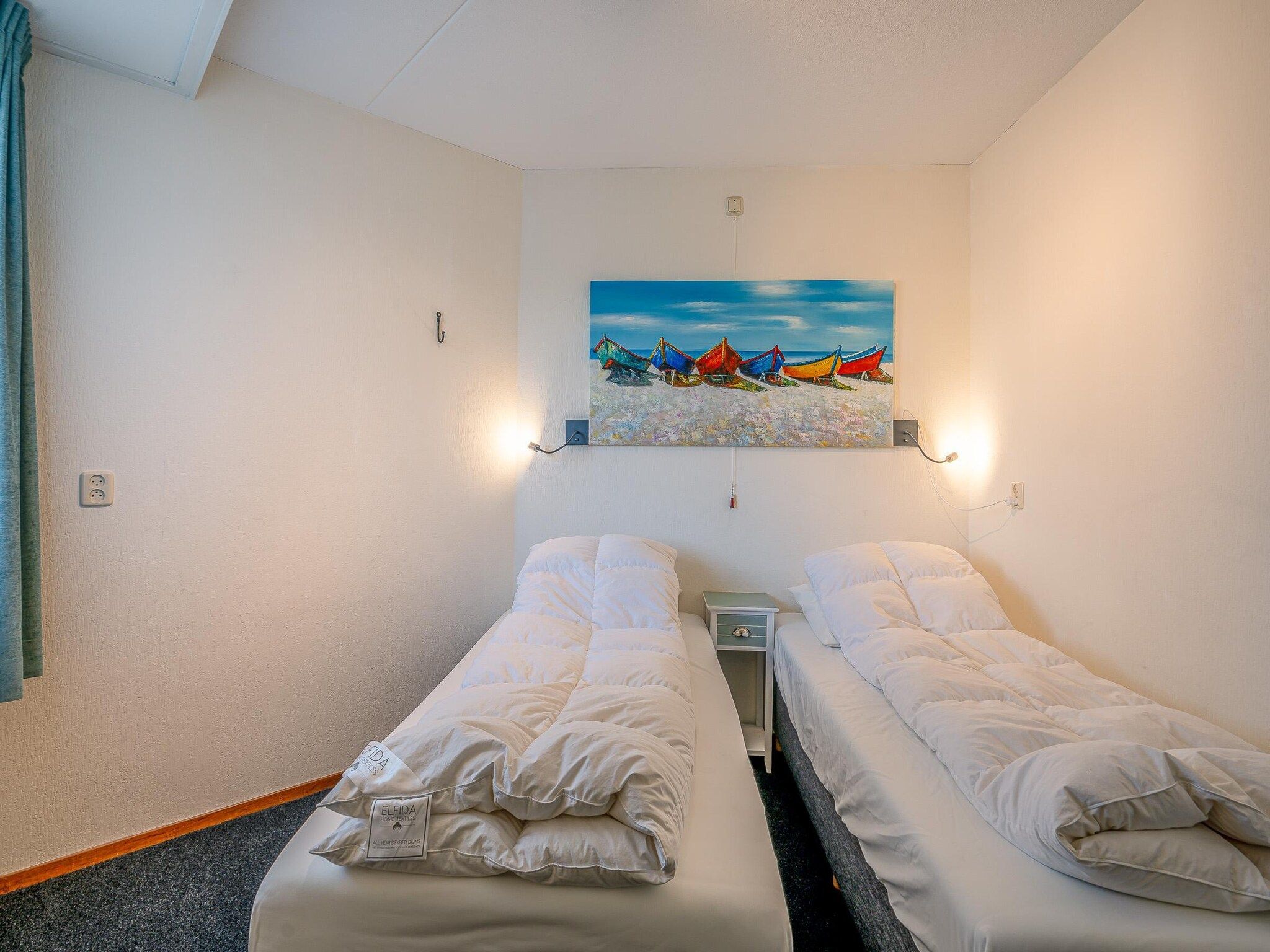 Een slaapkamer van Zeedistel 20 in De Koog