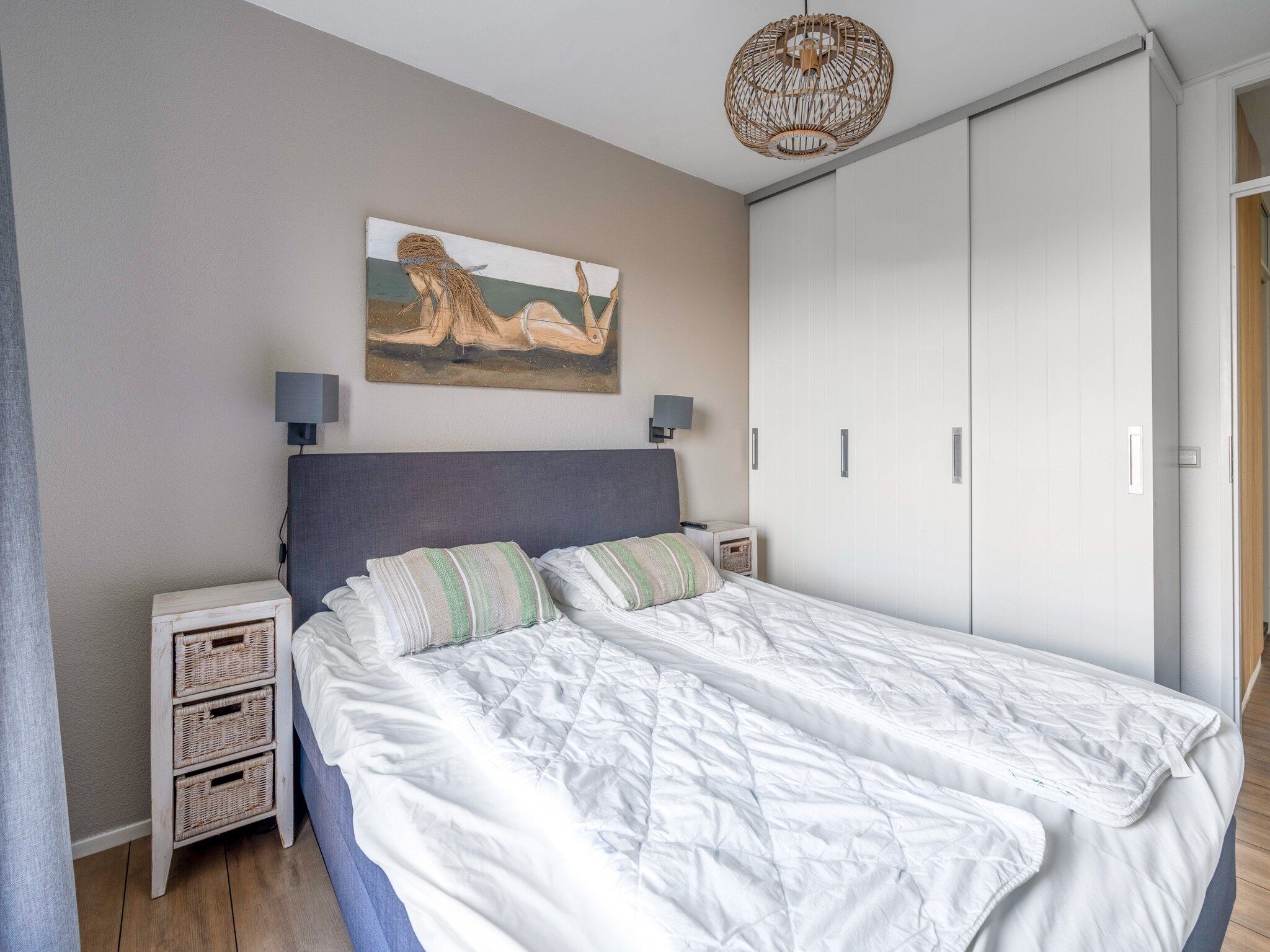 Een slaapkamer van Juliana 118 in De Koog