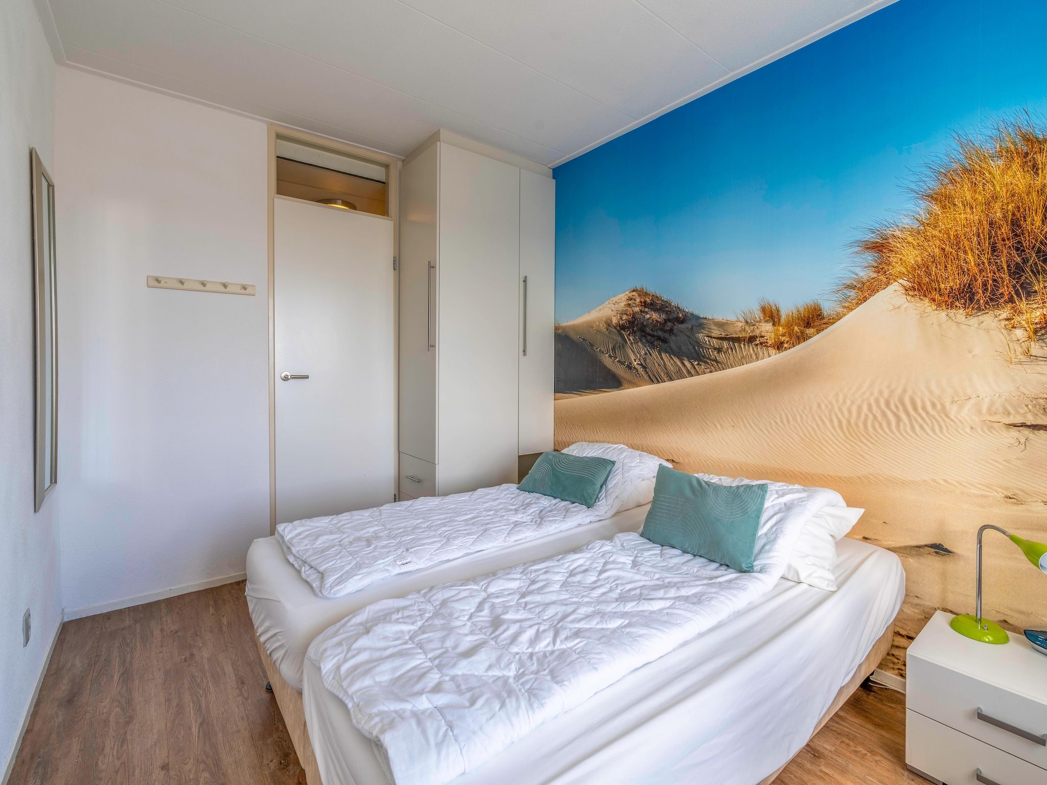 Een slaapkamer van Juliana 126 in De Koog