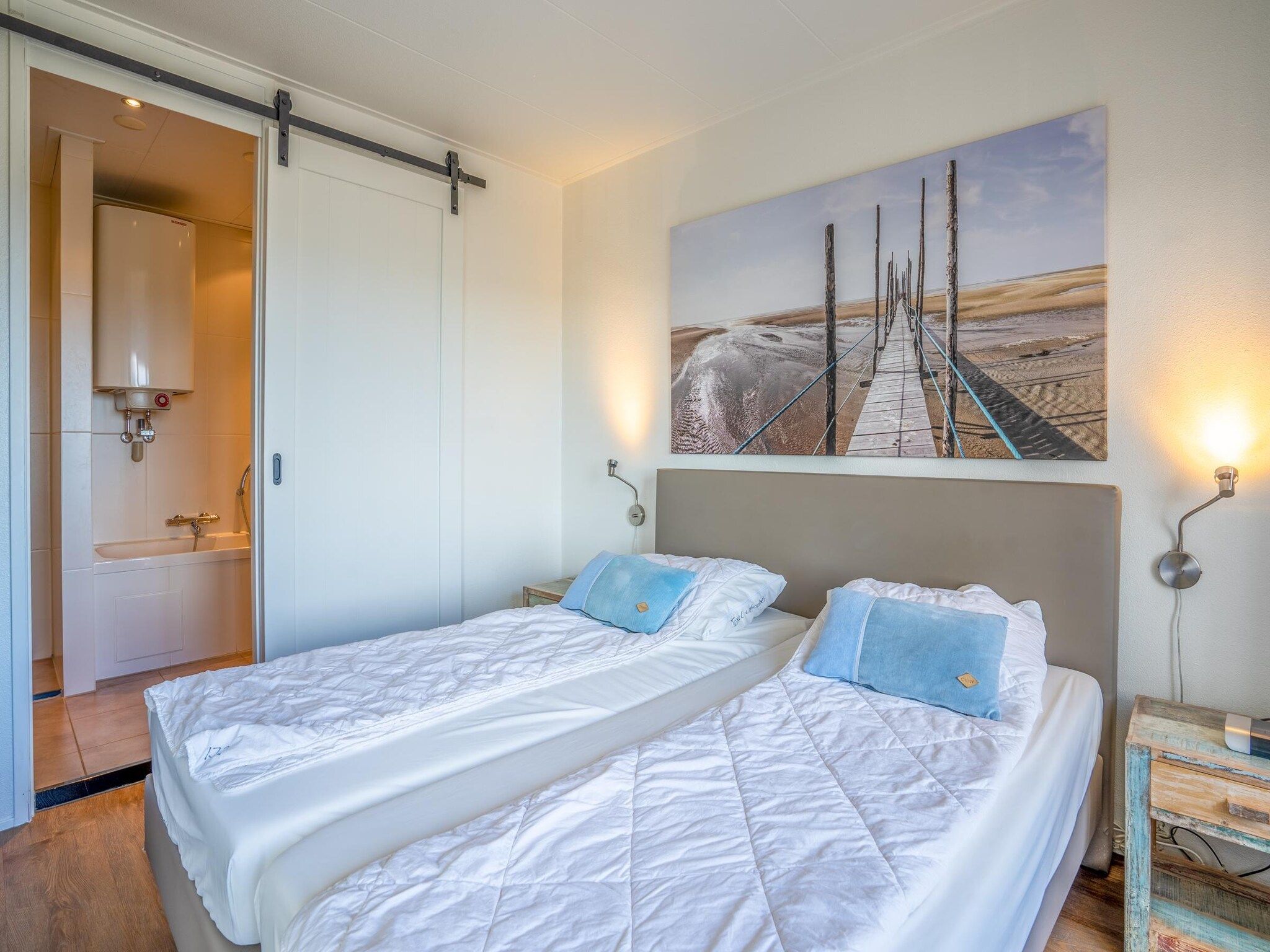 Een slaapkamer van Juliana 172 in De Koog