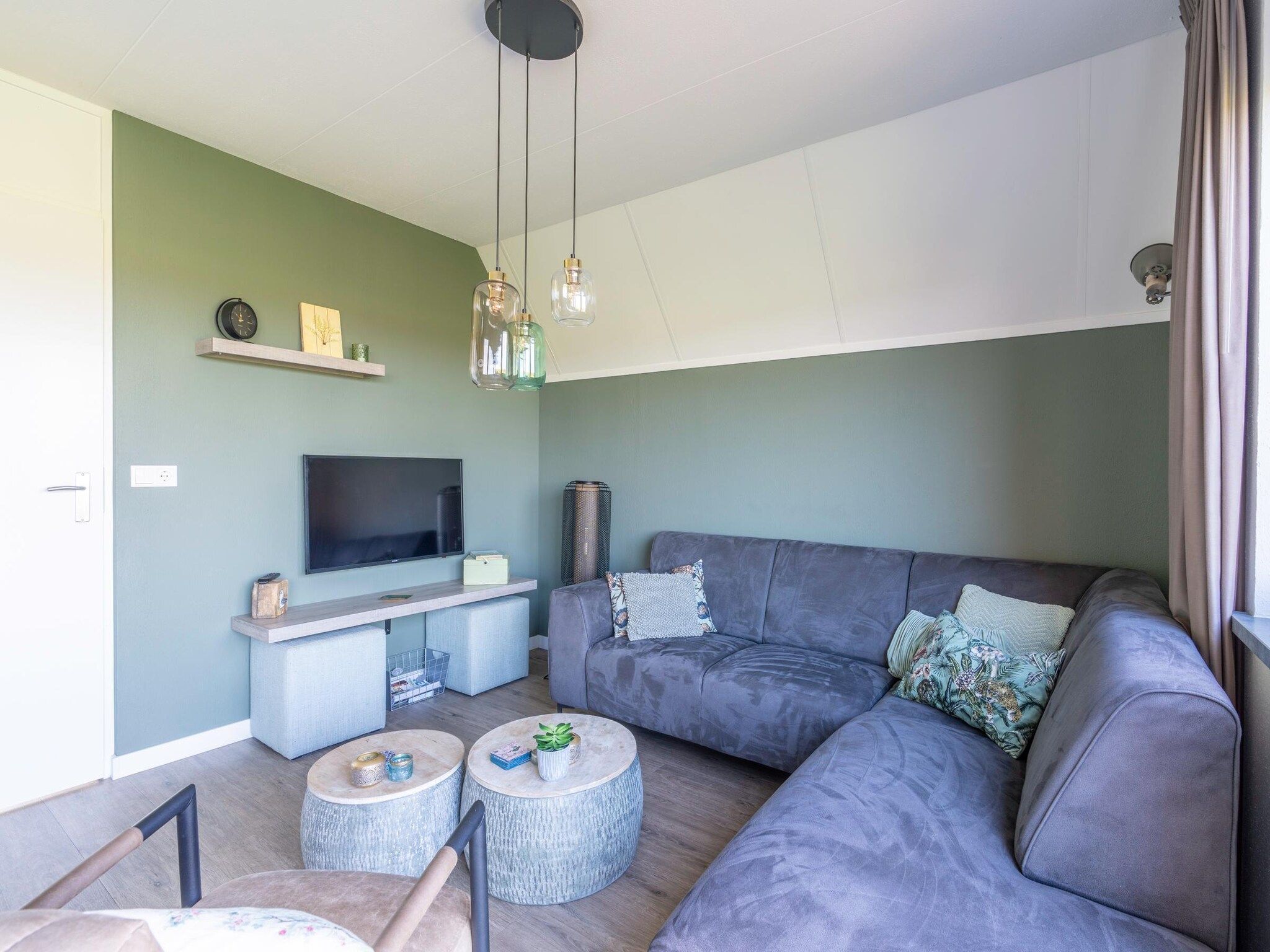 De woonkamer van Nieuwlanderweg 75 in De Waal