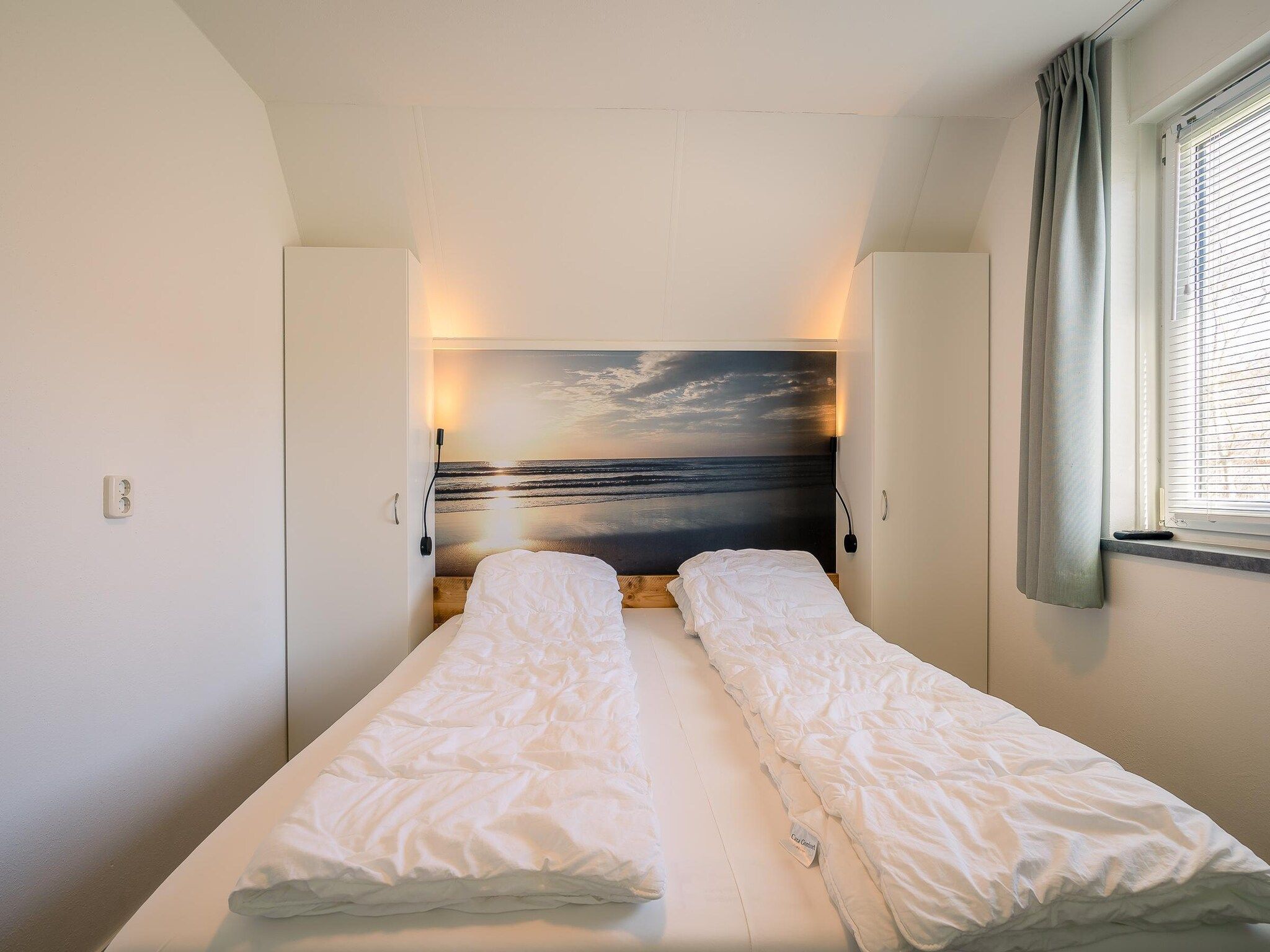 Een slaapkamer van Nieuwlanderweg 75 in De Waal