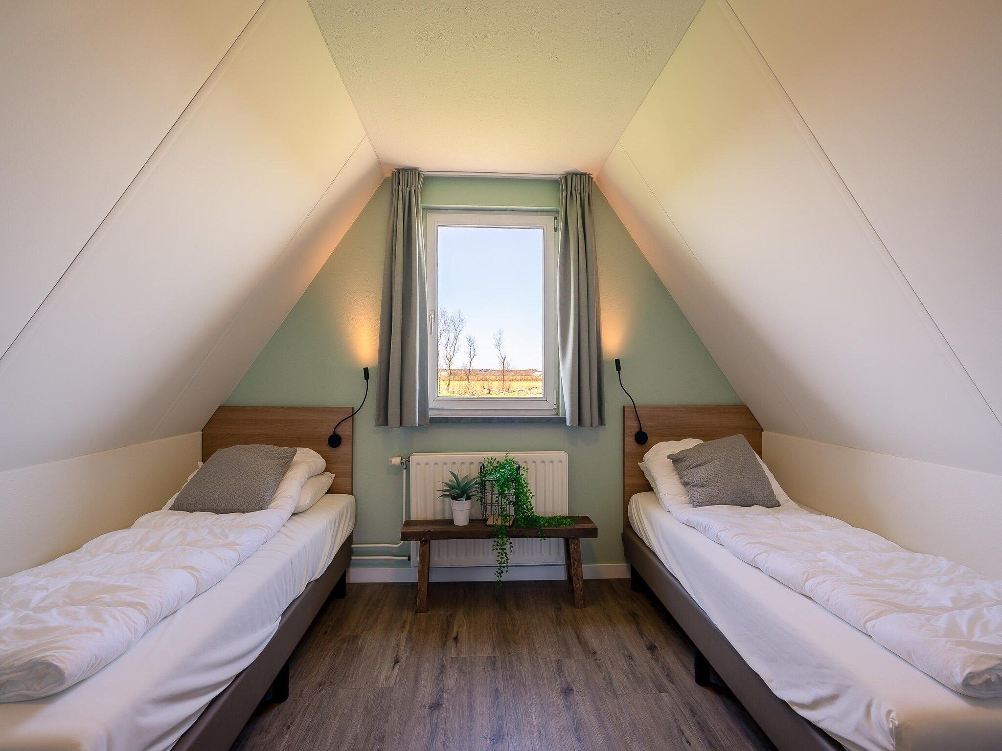 Een slaapkamer van Nieuwlanderweg 75 in De Waal