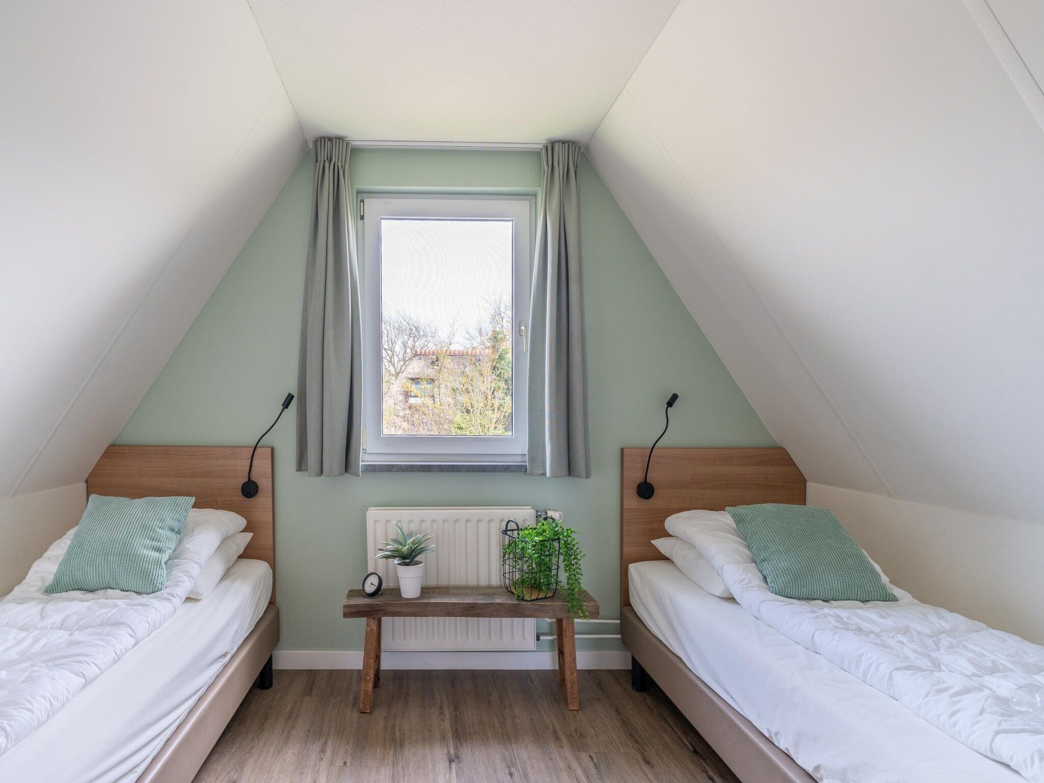 Een slaapkamer van Nieuwlanderweg 75 in De Waal