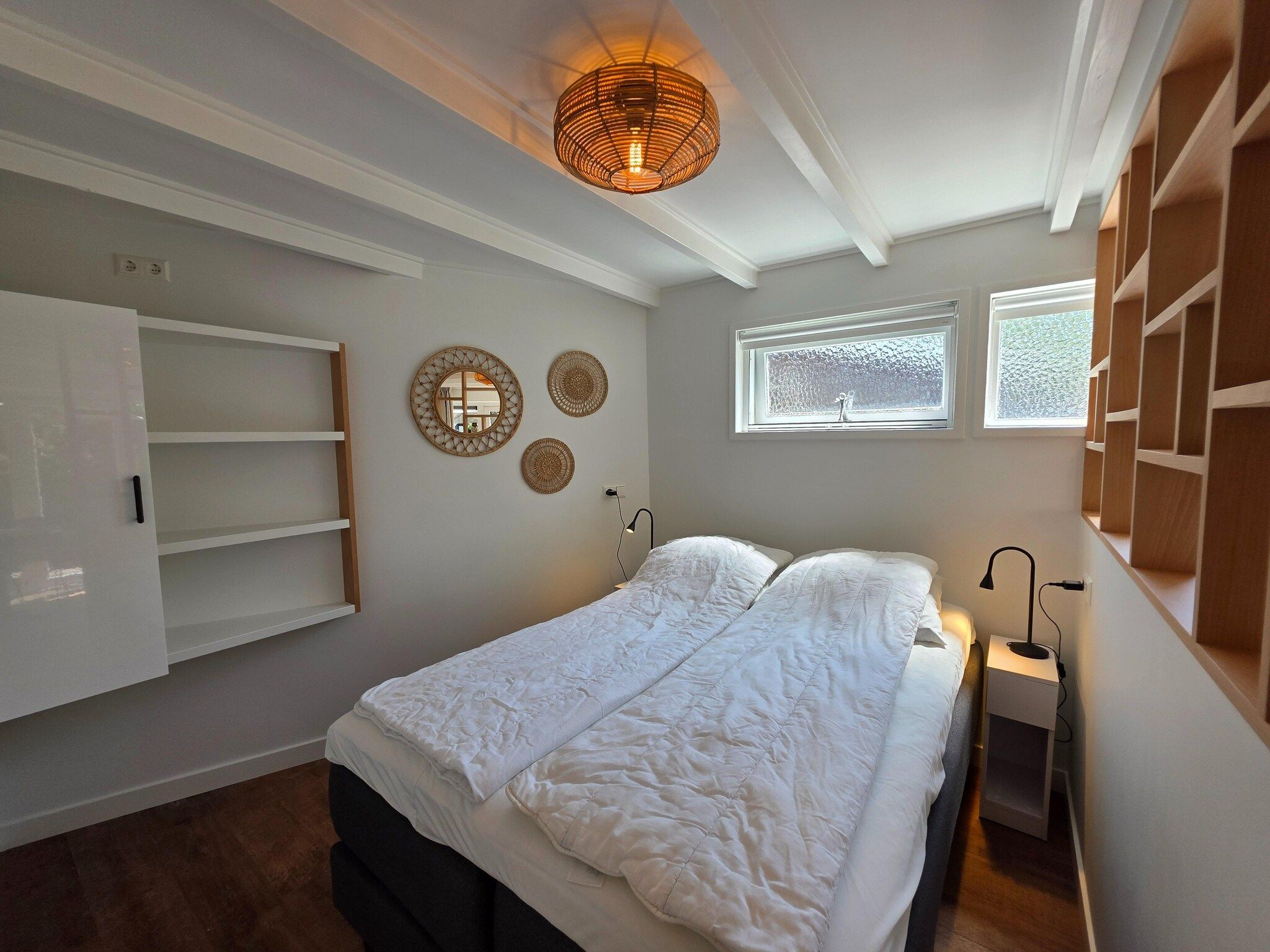 Een slaapkamer van Ruijslaan 13C - Achter de zandduyn in De Koog