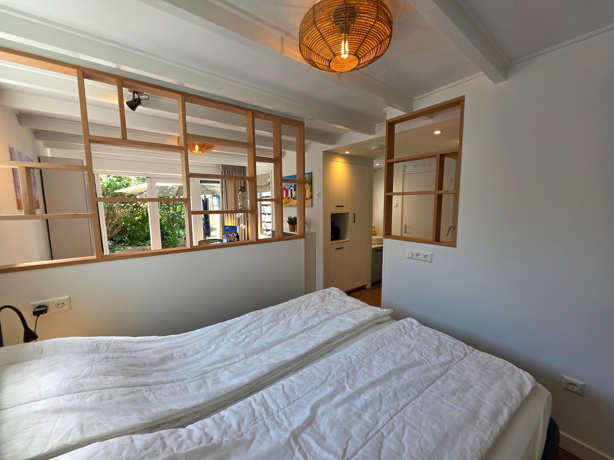 Een slaapkamer van Ruijslaan 13C - Achter de zandduyn in De Koog