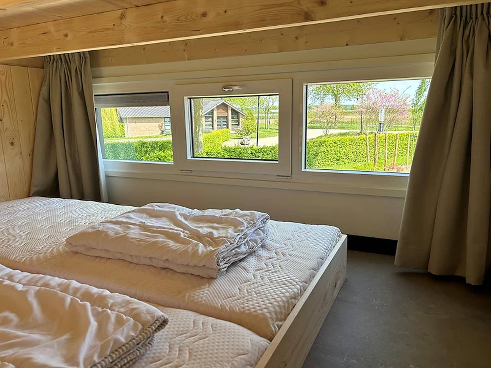 Een slaapkamer van Tiny House 2 Pax in Kesteren