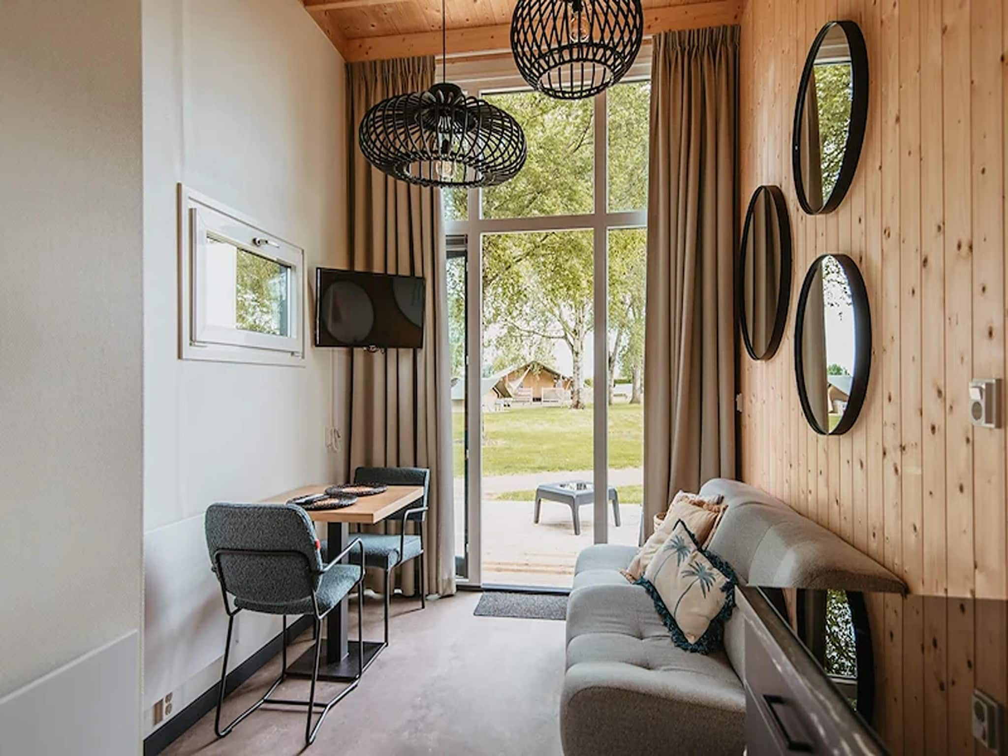 De woonkamer van Tiny House 2 Pax in Kesteren