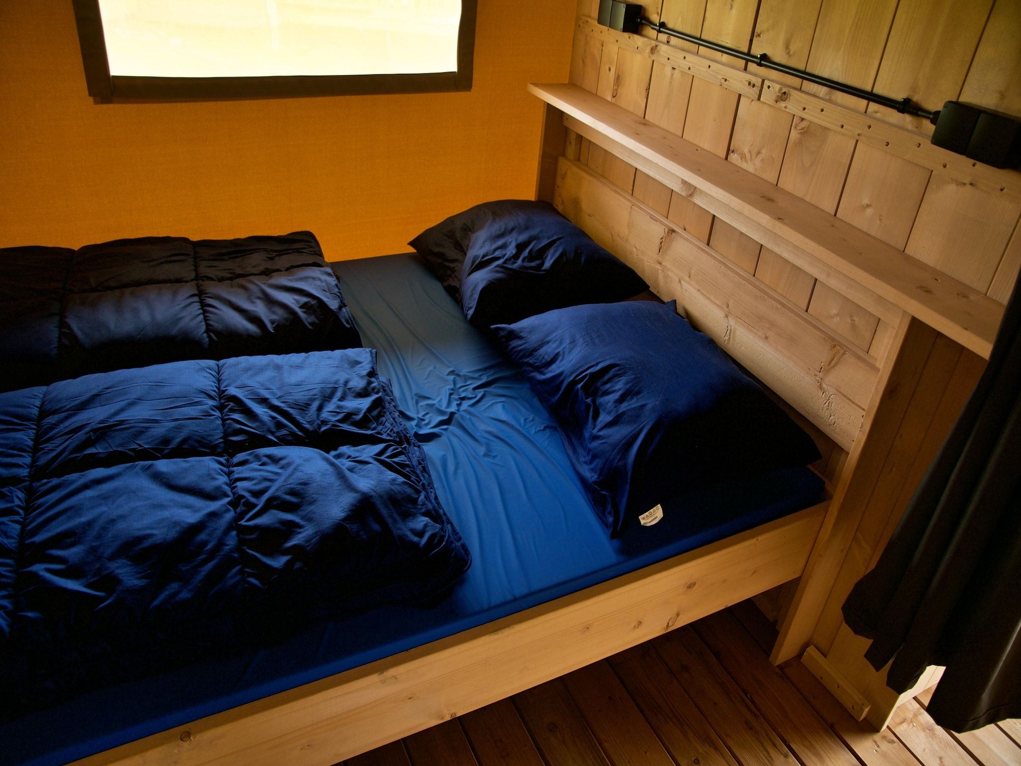 Een slaapkamer van Bloesem Lodge 4 pax in Kesteren