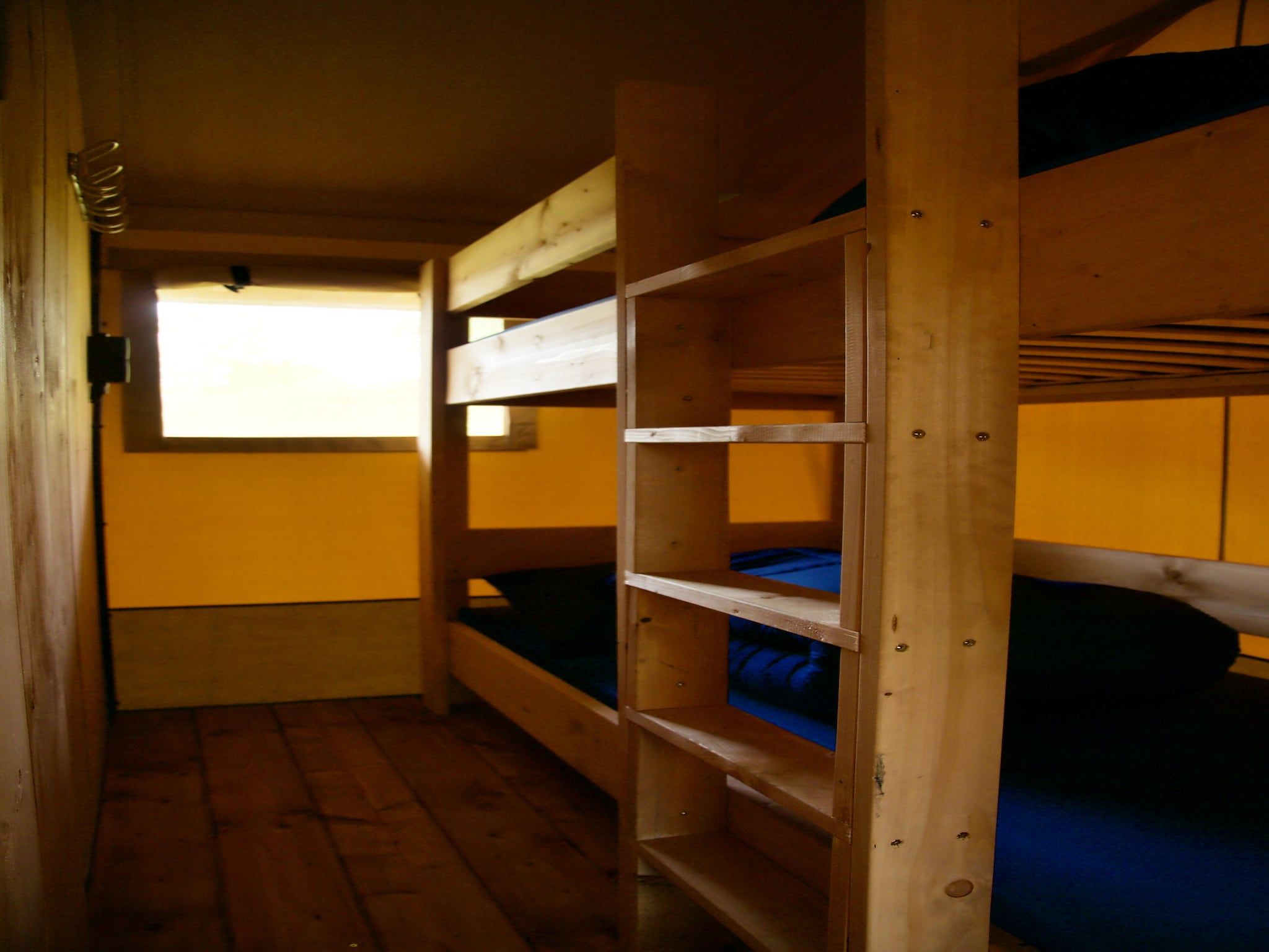 Een slaapkamer van Bloesem Lodge 4 pax in Kesteren